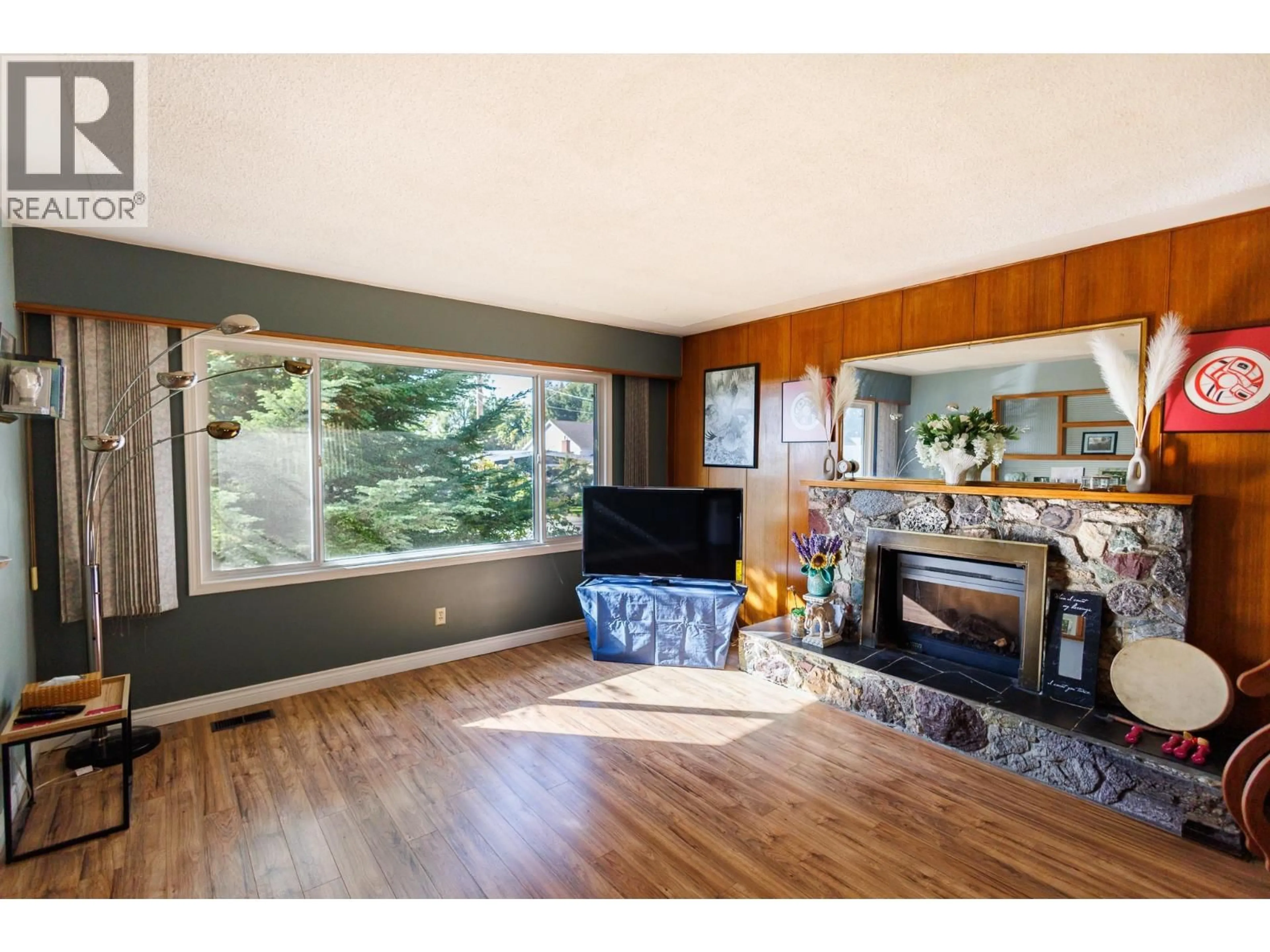 Living room with furniture, wood/laminate floor for 4726 SOUCIE AVENUE, Terrace British Columbia V8G2G1