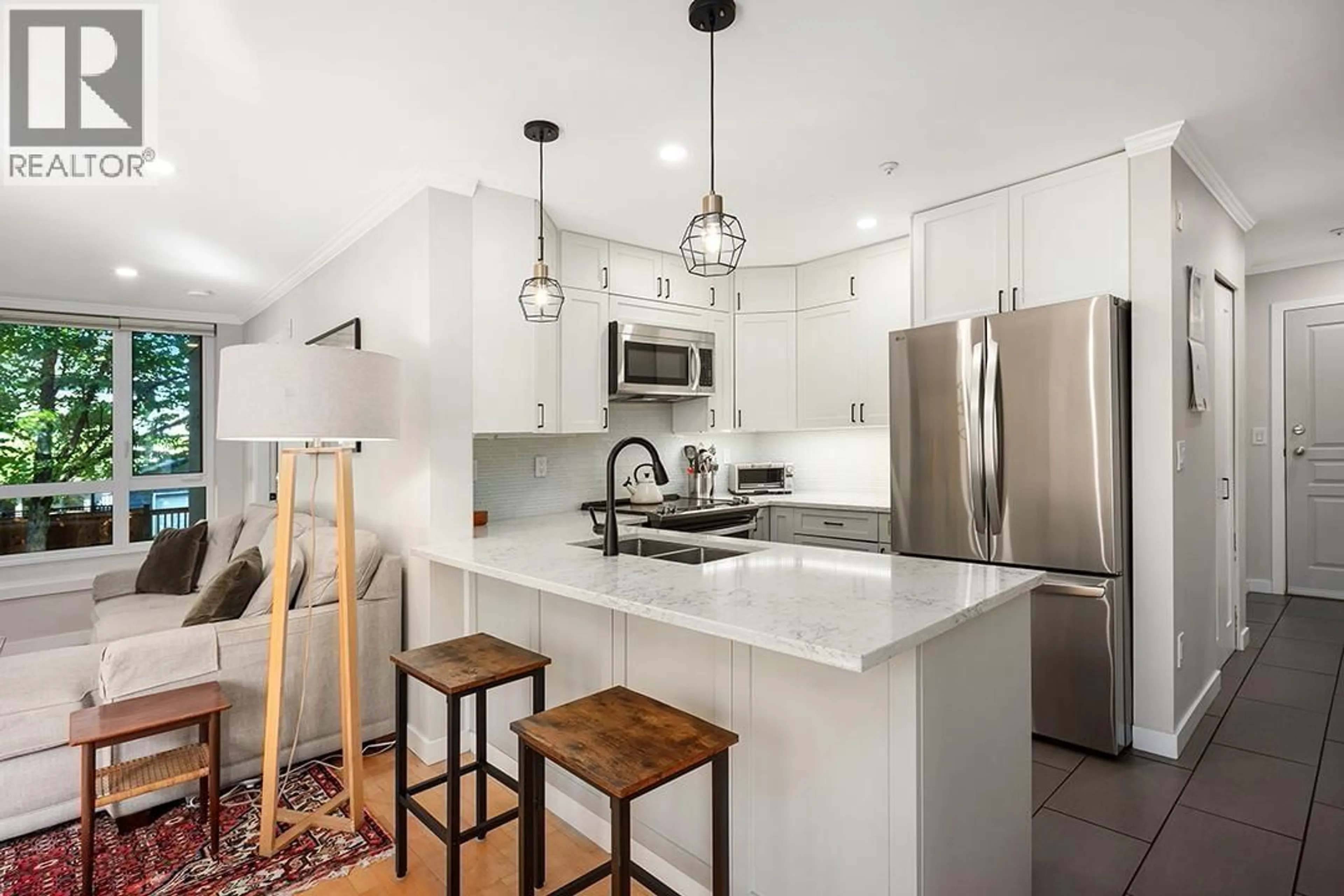 Open concept kitchen, ceramic/tile floor for 203 - 3235 4TH AVENUE, Vancouver British Columbia V6K1R8