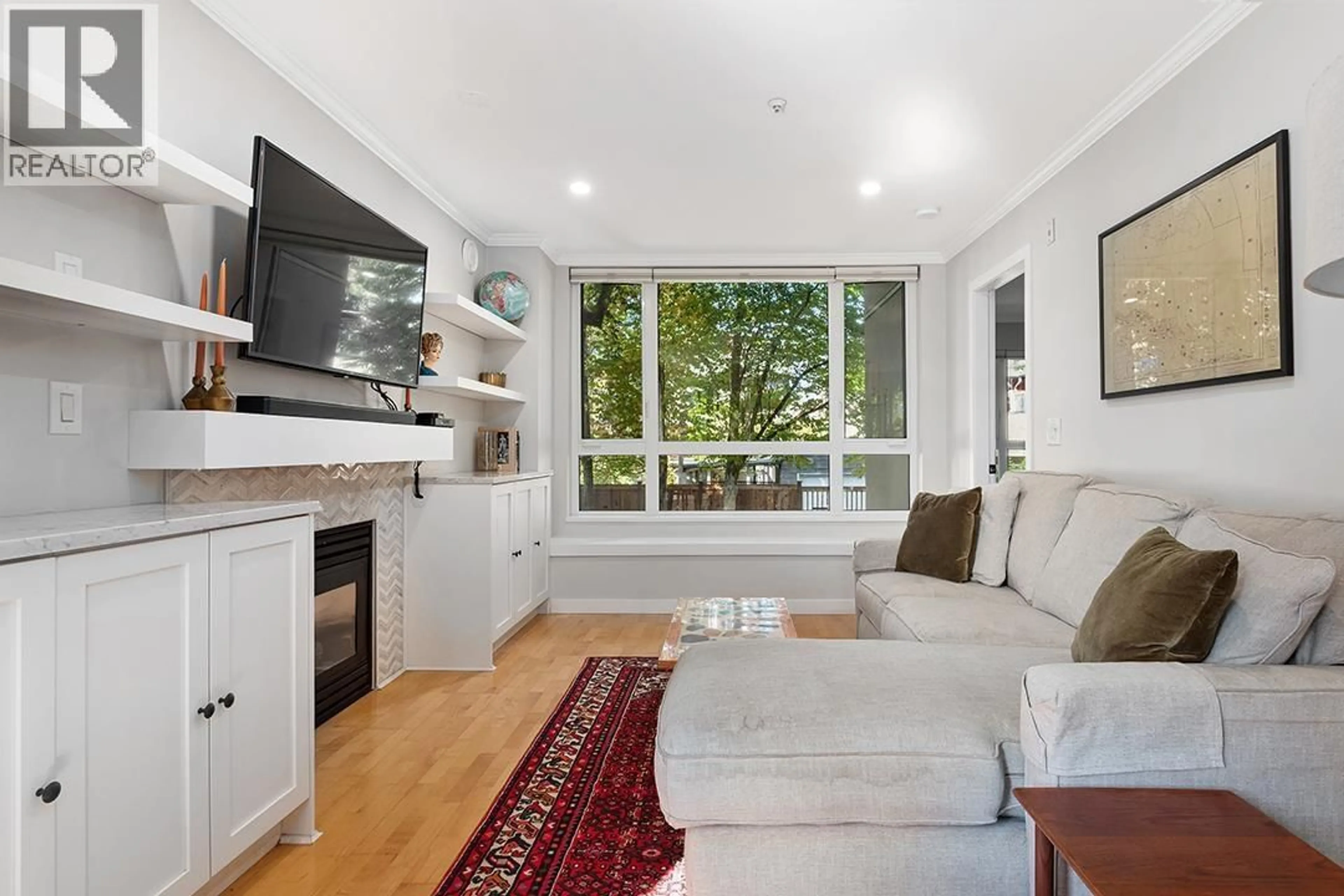 Living room with furniture, unknown for 203 - 3235 4TH AVENUE, Vancouver British Columbia V6K1R8