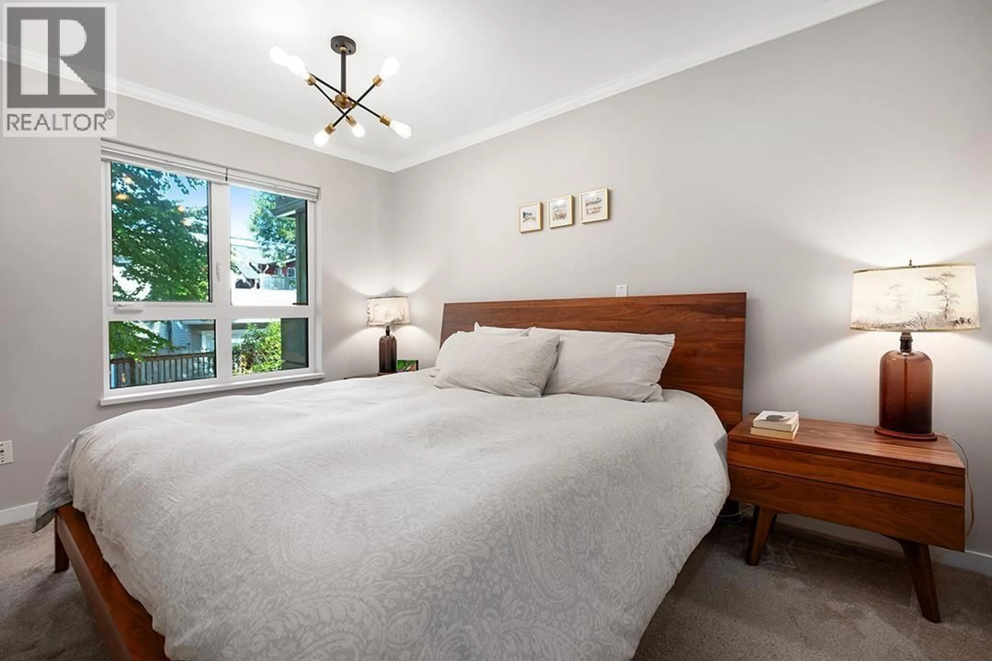 Bedroom with bed, unknown for 203 - 3235 4TH AVENUE, Vancouver British Columbia V6K1R8