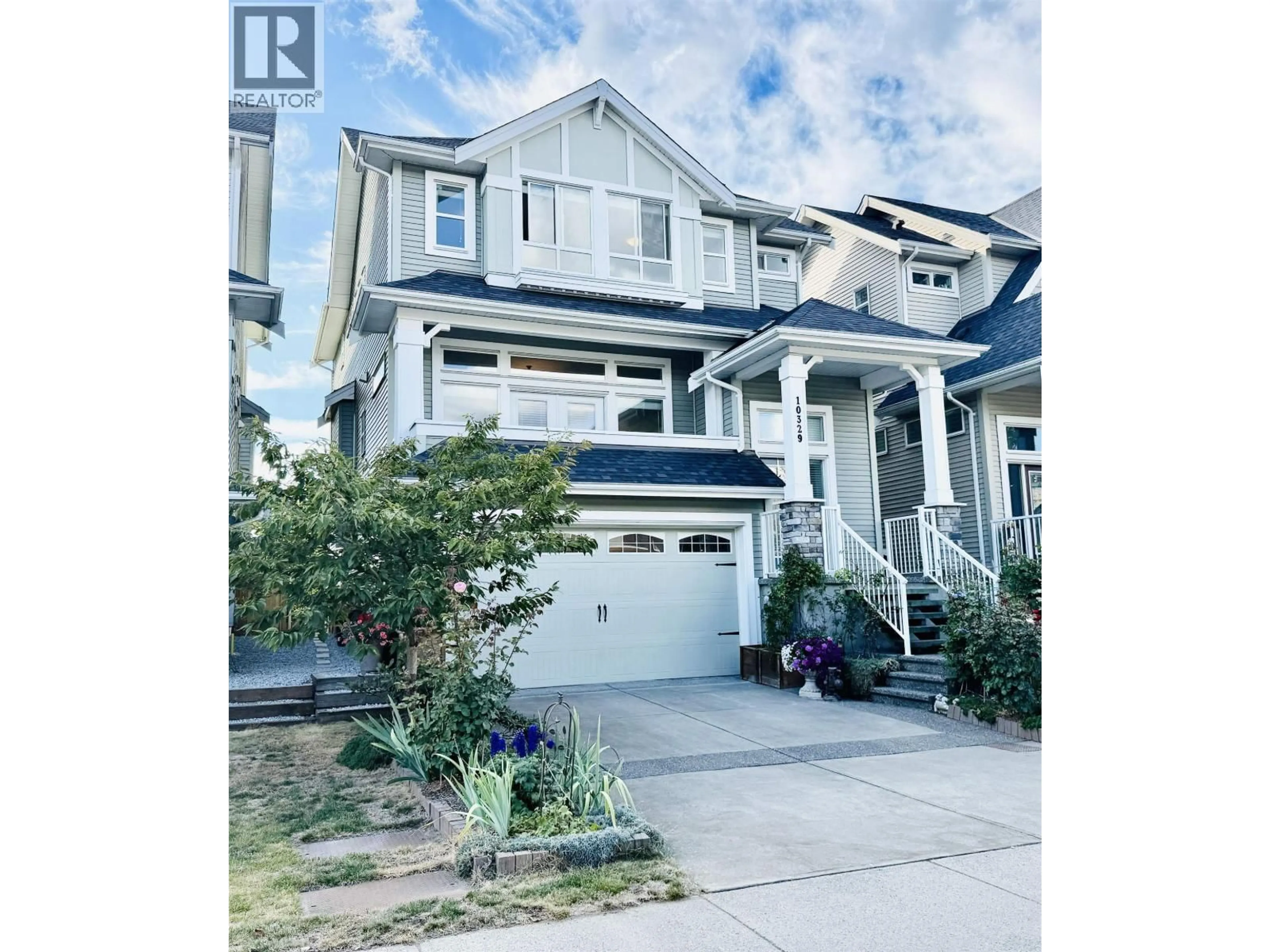 Home with vinyl exterior material, street for 10329 238A STREET, Maple Ridge British Columbia V2W1G3