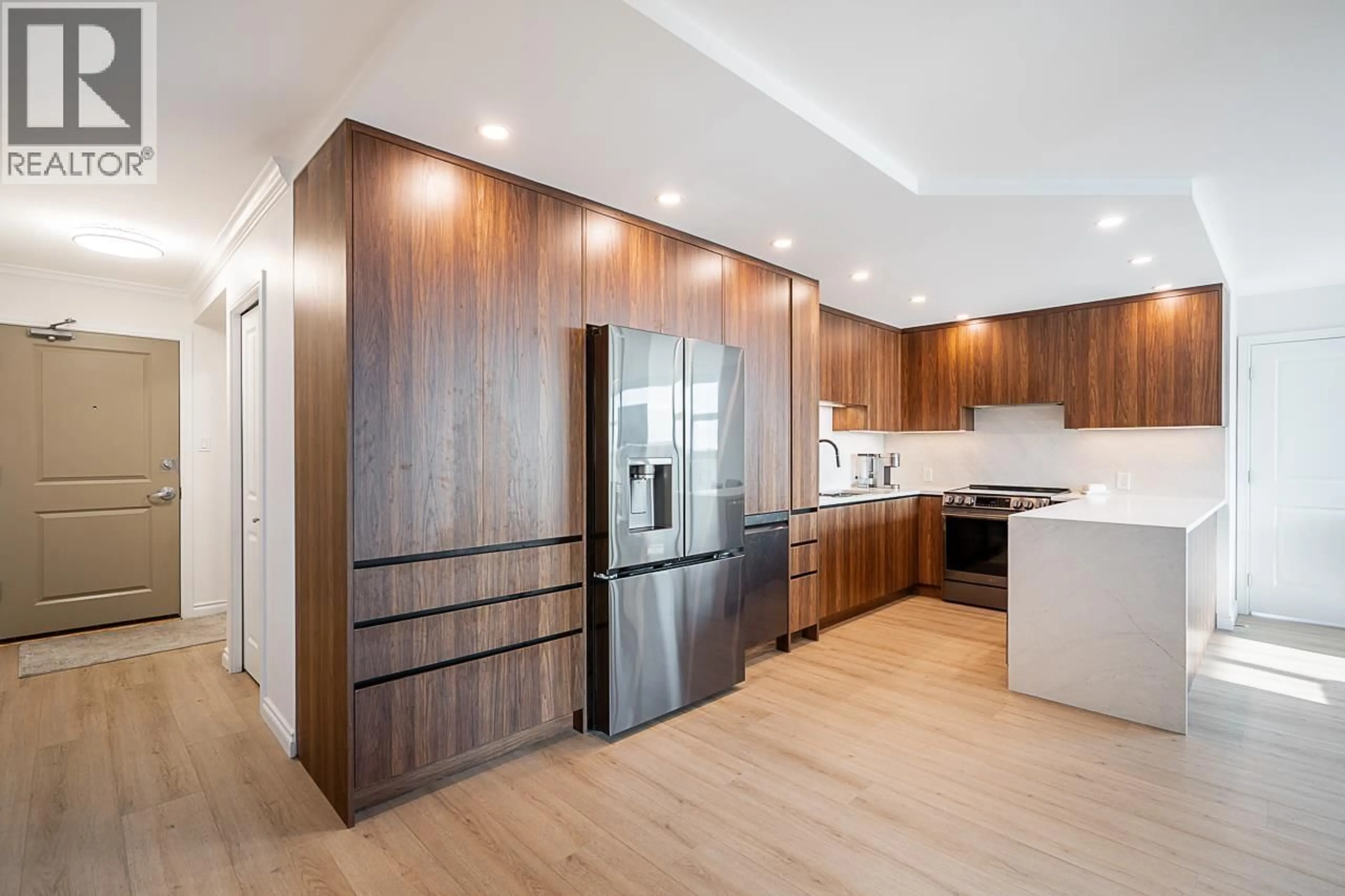 Open concept kitchen, wood/laminate floor for 1906 - 4388 BUCHANAN STREET, Burnaby British Columbia V5C6R8