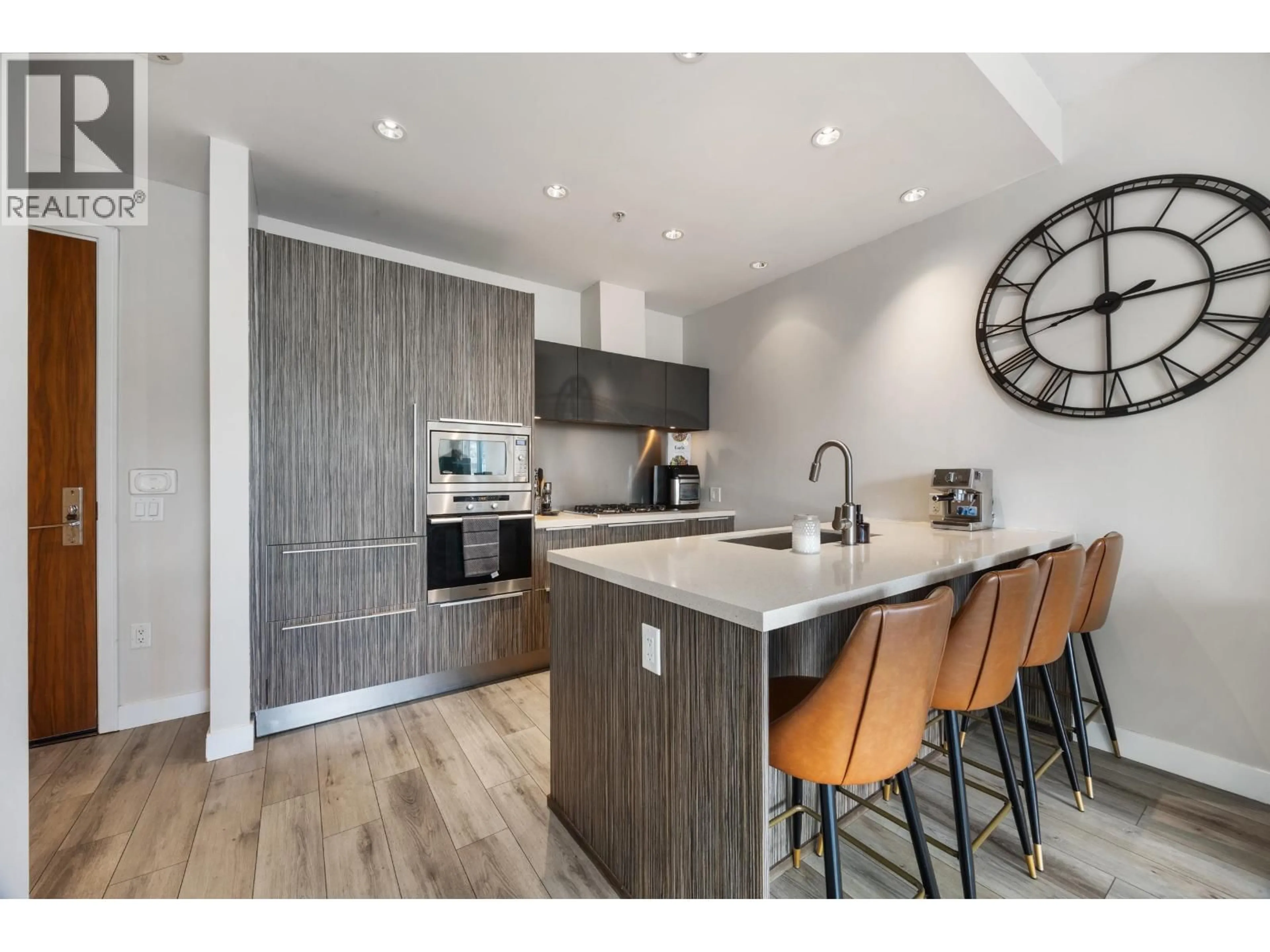 Open concept kitchen, wood/laminate floor for 806 - 1633 ONTARIO STREET, Vancouver British Columbia V5Y0C2