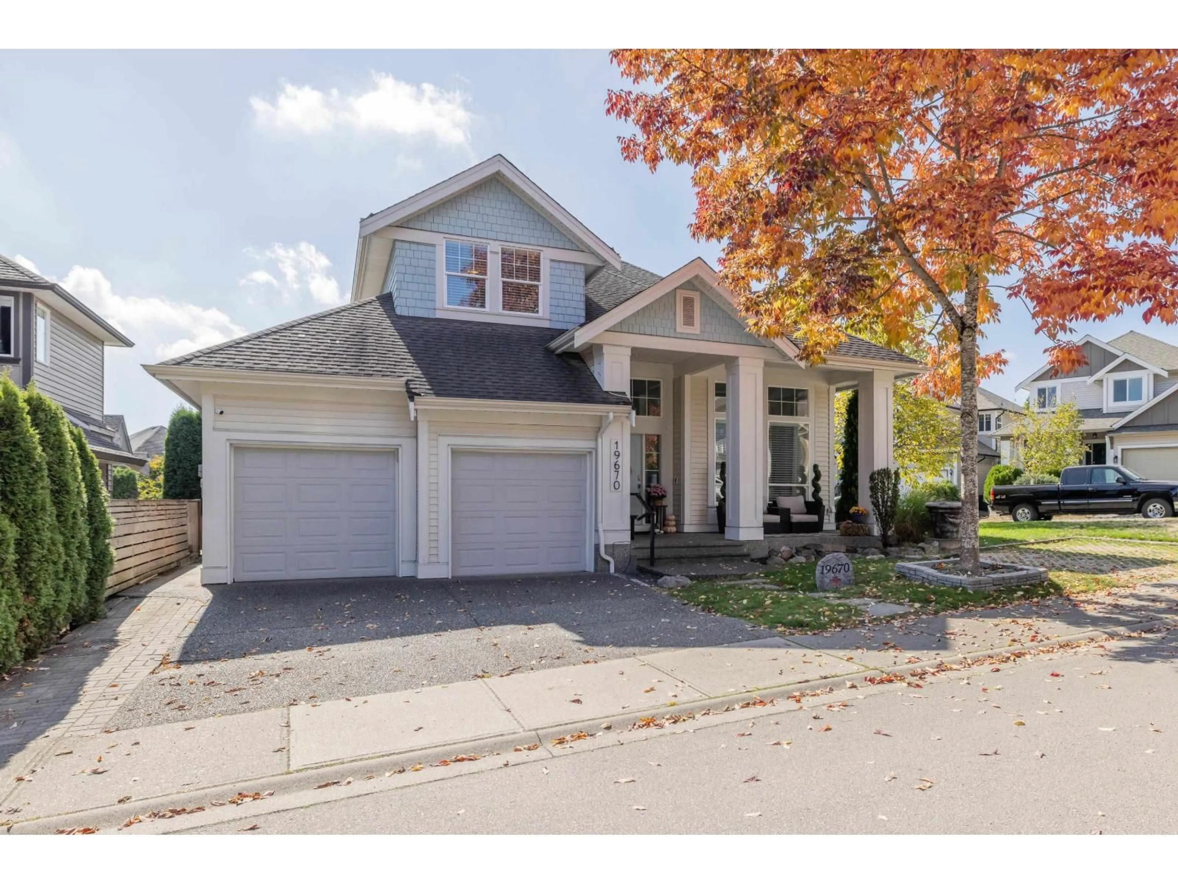 Home with vinyl exterior material, street for 19670 68A AVENUE, Langley British Columbia V2Y3H2
