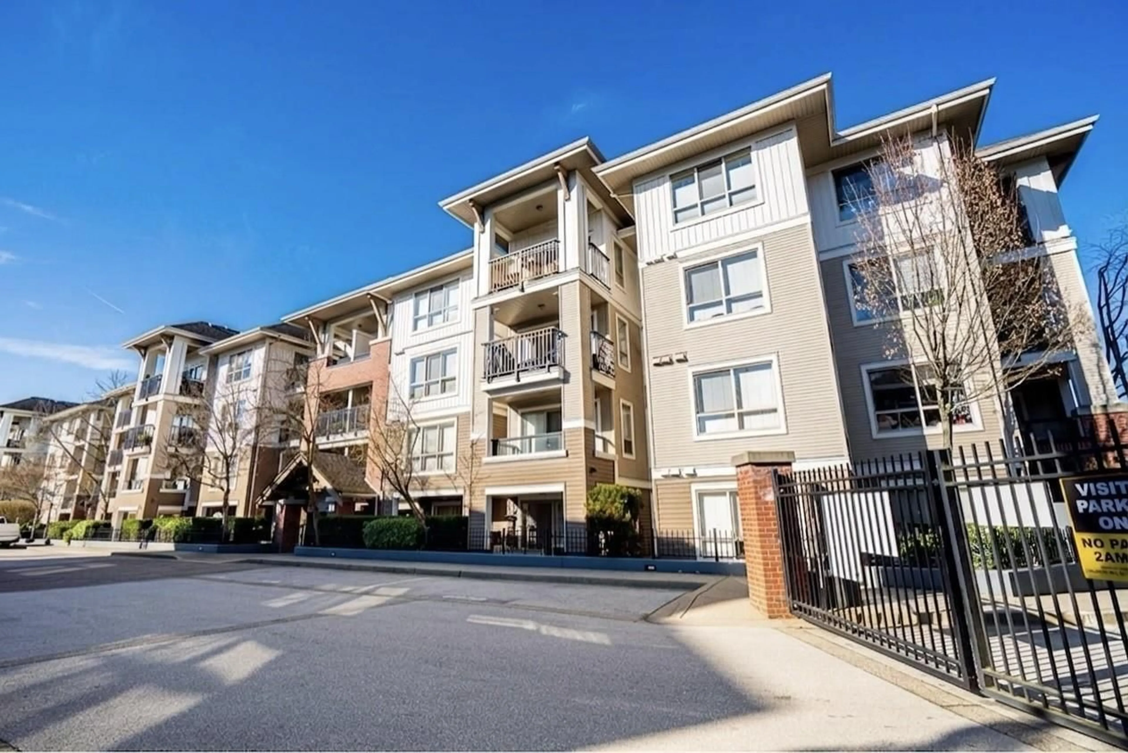 A pic from outside/outdoor area/front of a property/back of a property/a pic from drone, street for E209 - 8929 202 STREET, Langley British Columbia V1M0B4