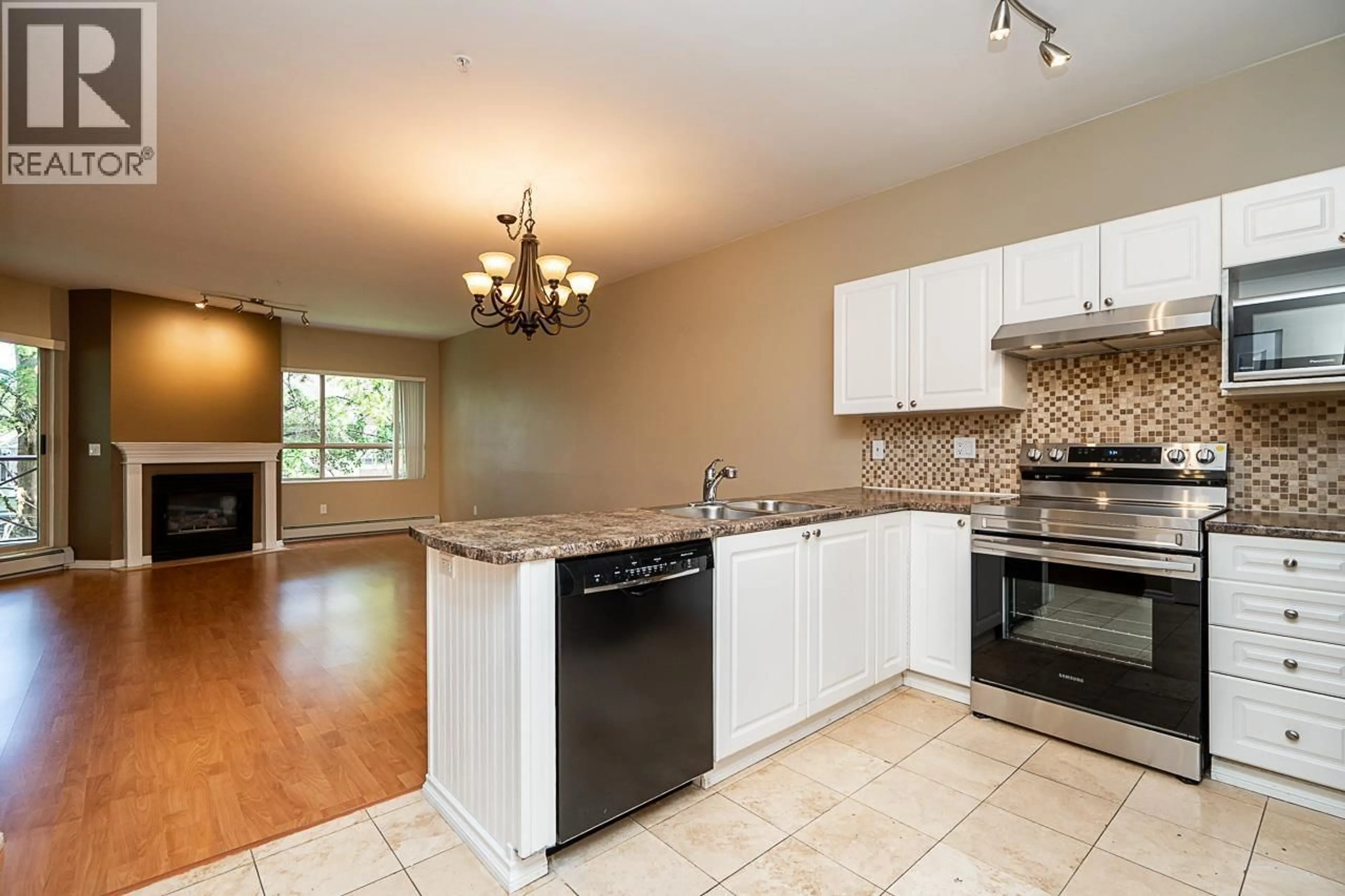 Open concept kitchen, unknown for 222 - 2109 ROWLAND STREET, Port Coquitlam British Columbia V3C6J4