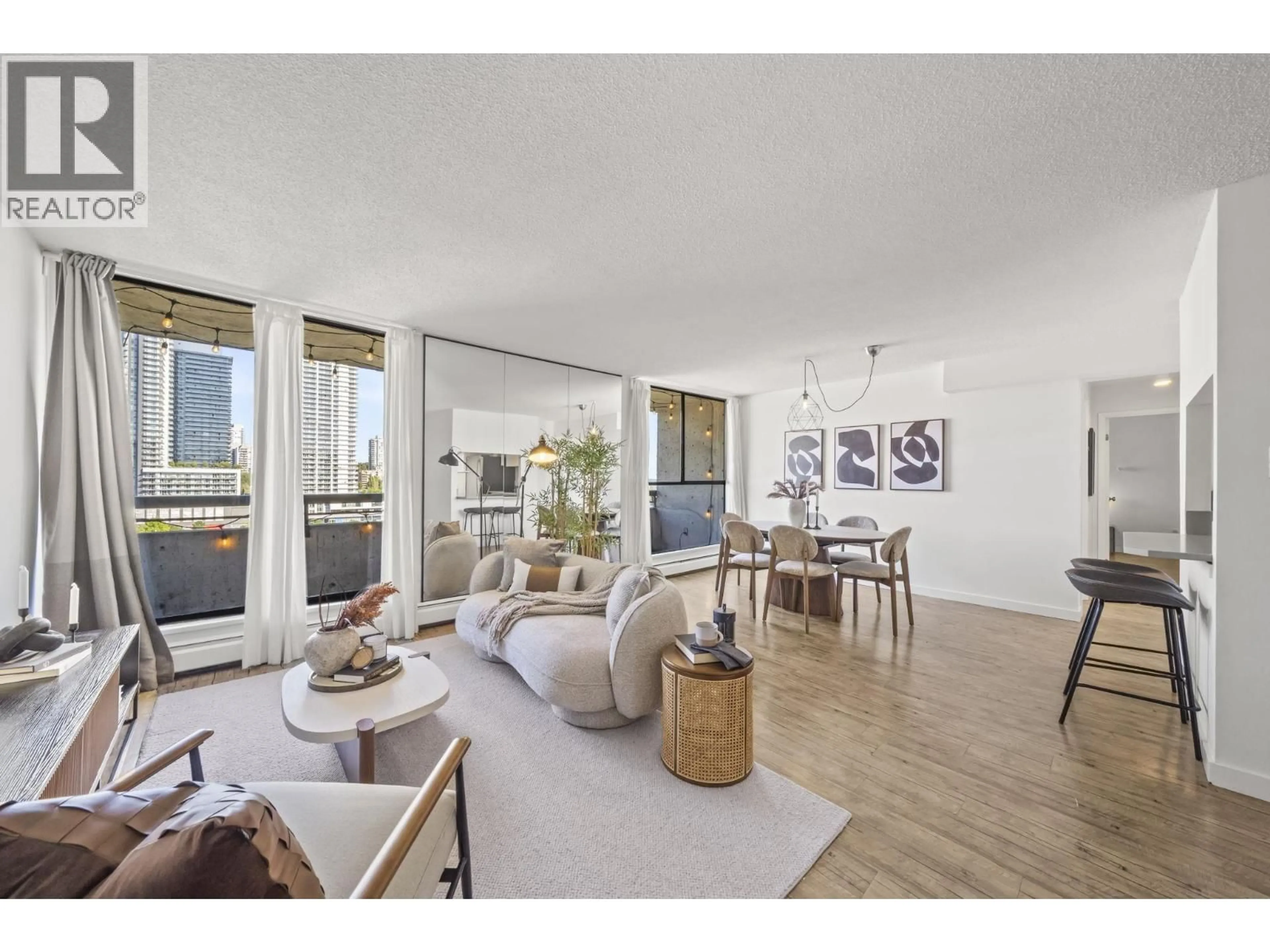 Living room with furniture, wood/laminate floor for 1504 - 3771 BARTLETT COURT, Burnaby British Columbia V3J7G8