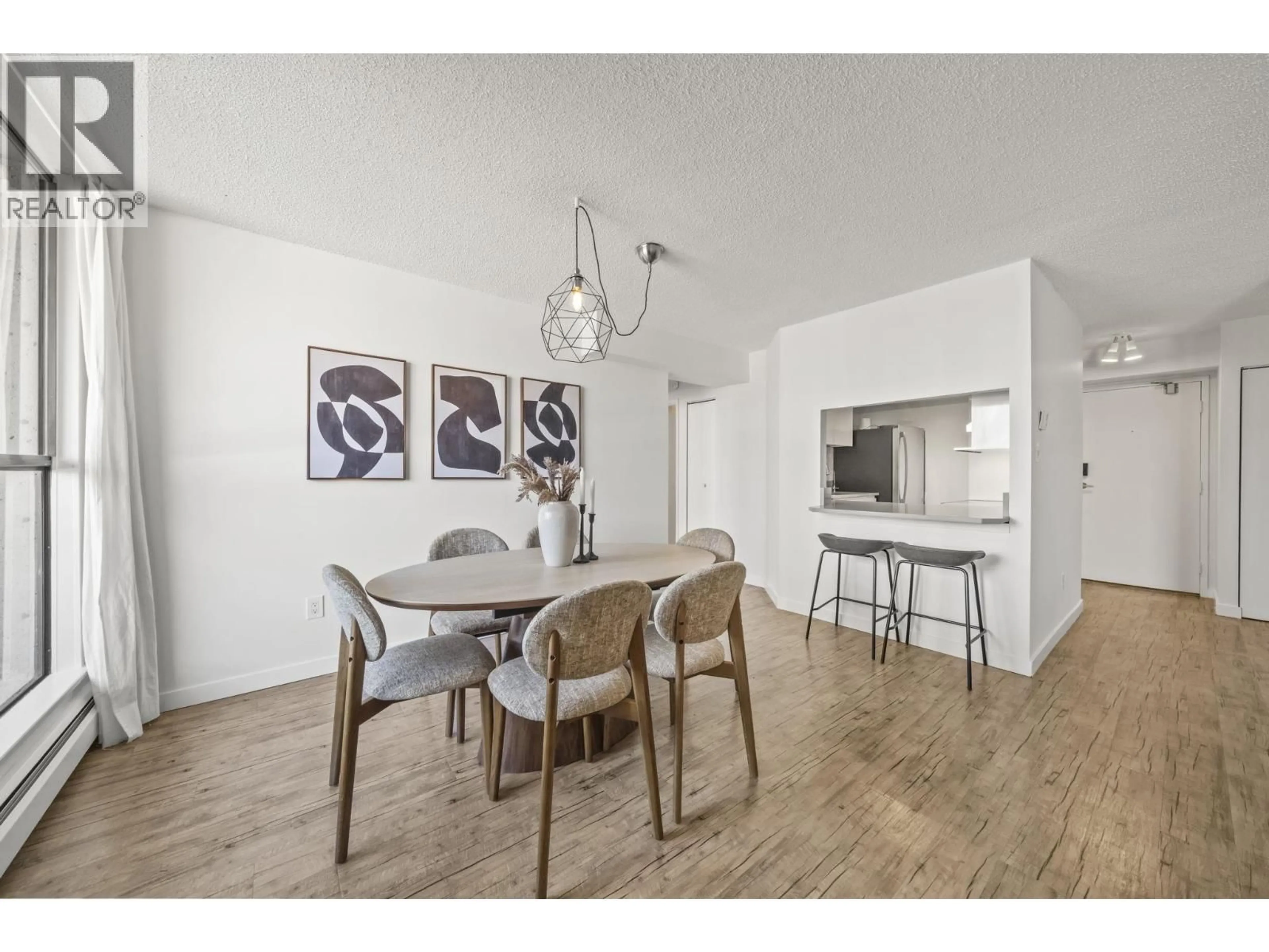 Dining room, wood/laminate floor for 1504 - 3771 BARTLETT COURT, Burnaby British Columbia V3J7G8