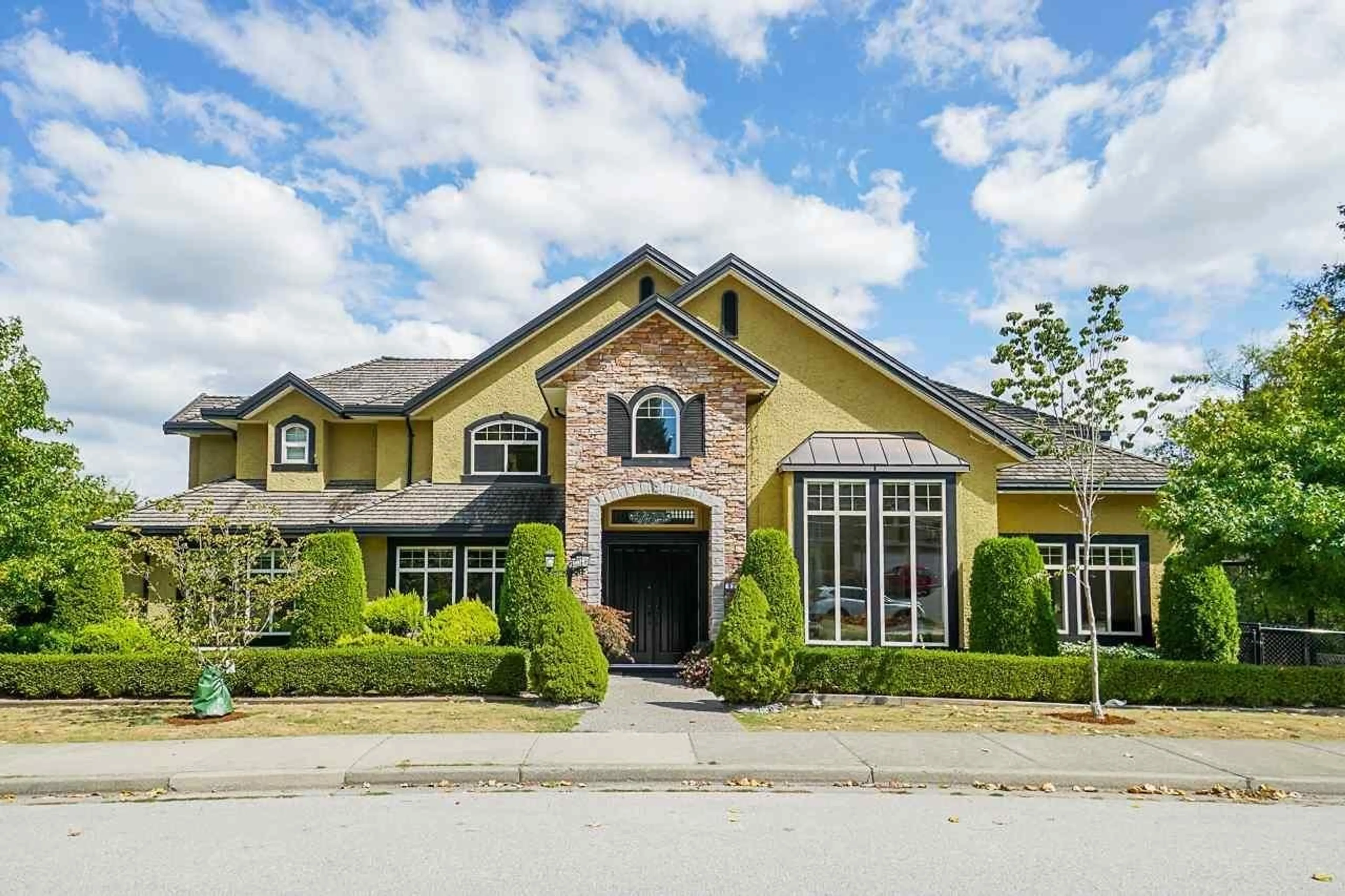 Home with brick exterior material, street for 9238 164 STREET, Surrey British Columbia V4N3C9