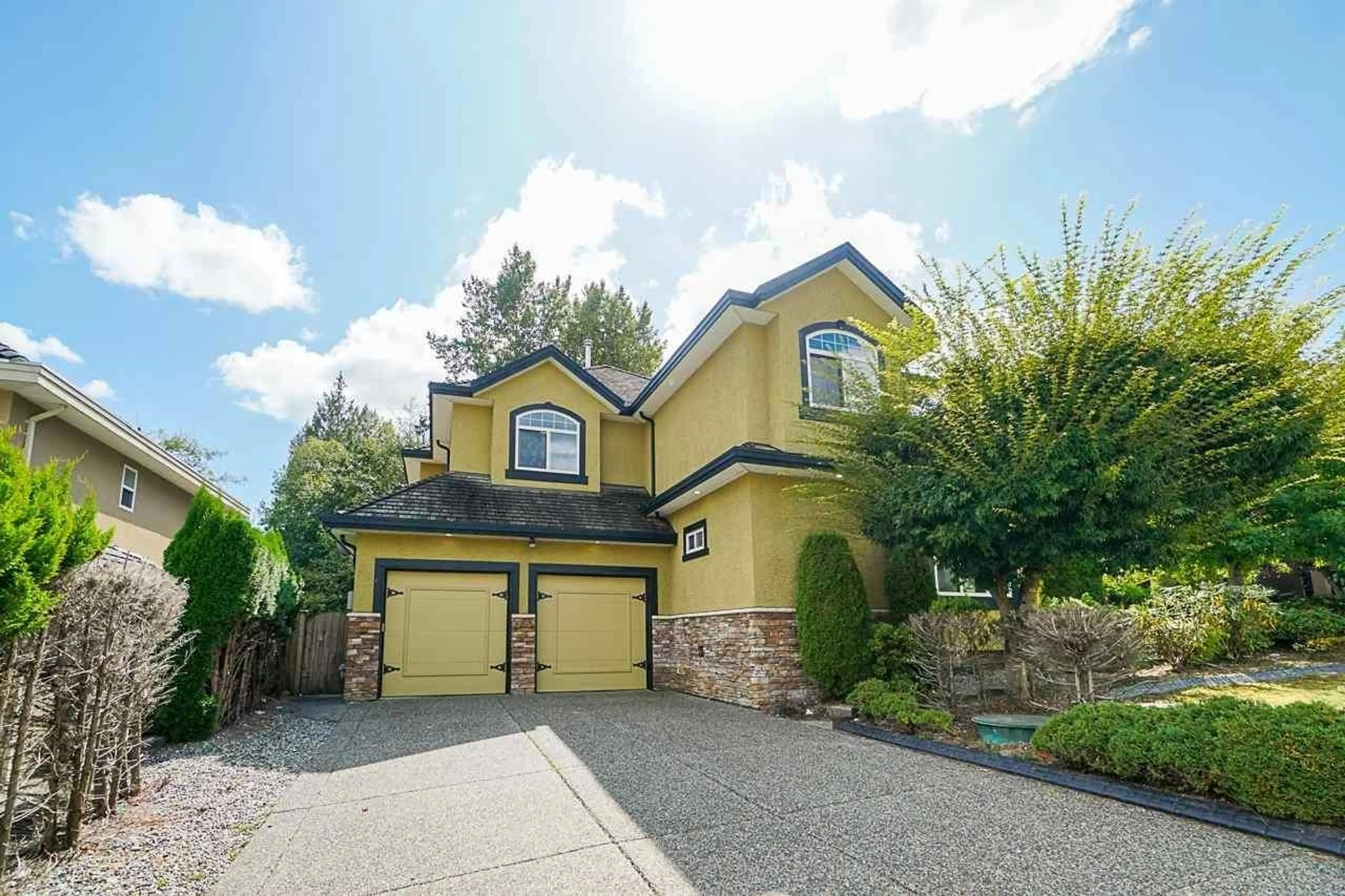 Home with vinyl exterior material, street for 9238 164 STREET, Surrey British Columbia V4N3C9