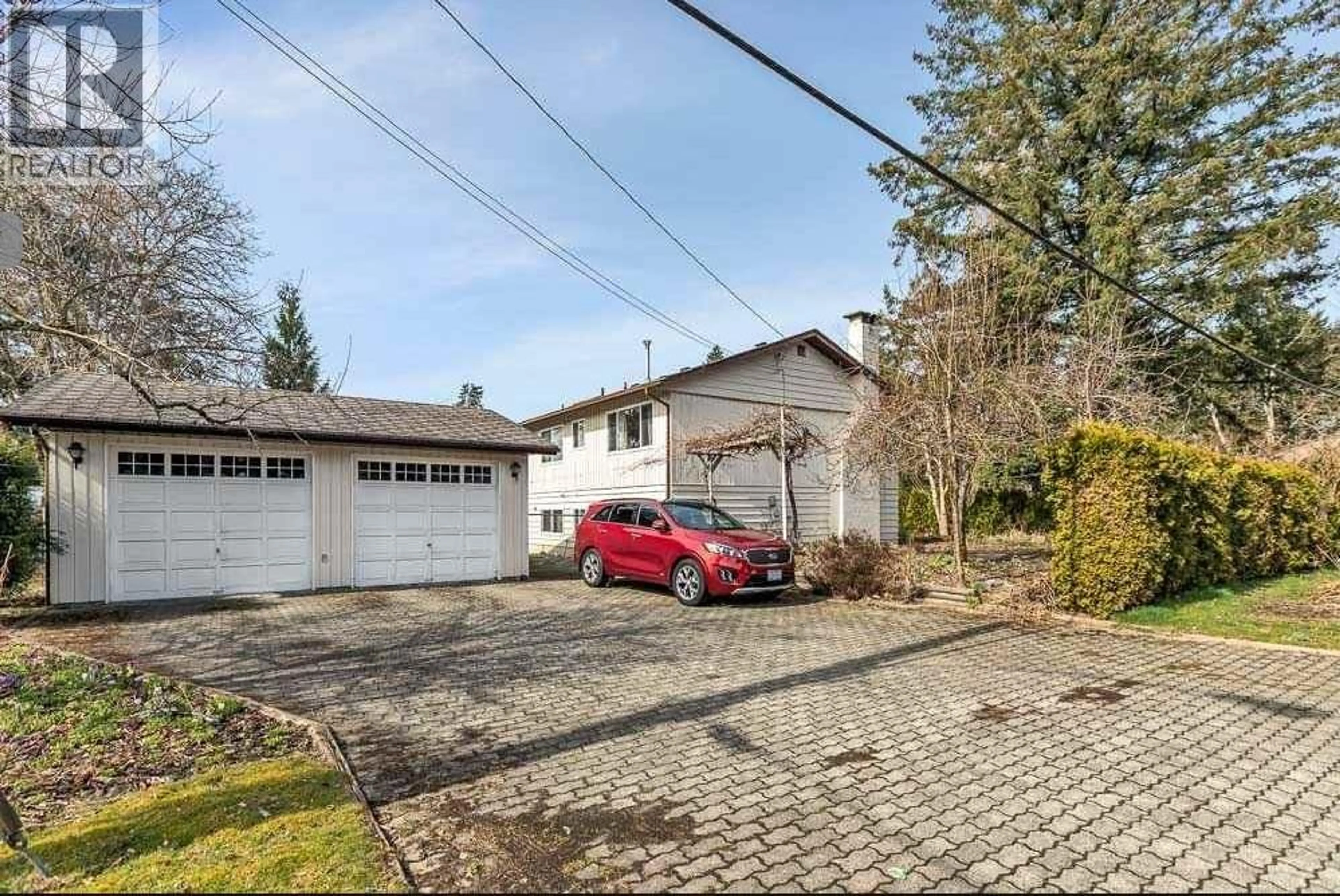 A pic from outside/outdoor area/front of a property/back of a property/a pic from drone, street for 20932 CAMWOOD AVENUE, Maple Ridge British Columbia V2X2P1