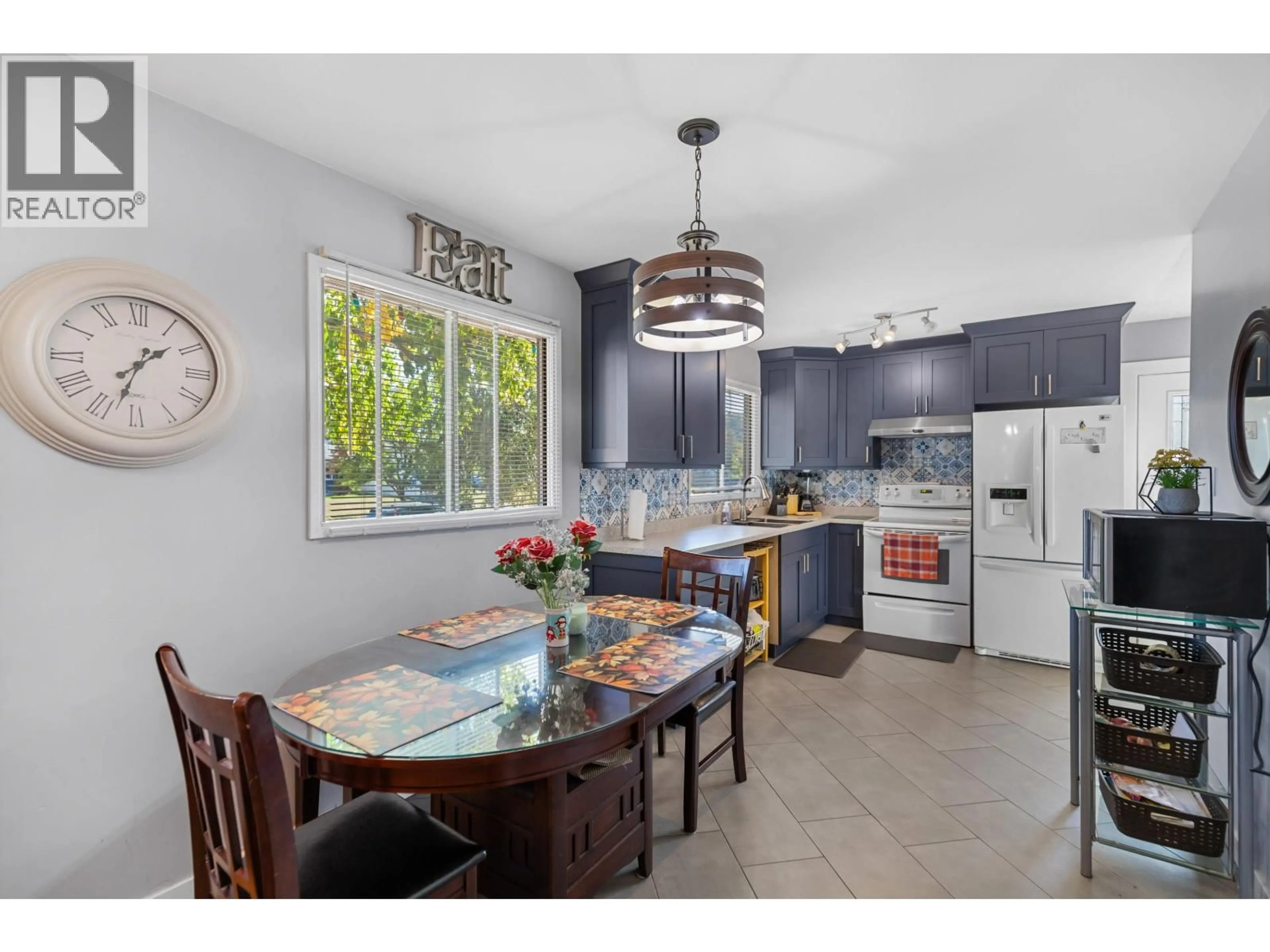 Open concept kitchen, ceramic/tile floor for 3918 ENEMARK CRESCENT, Prince George British Columbia V2N2X5