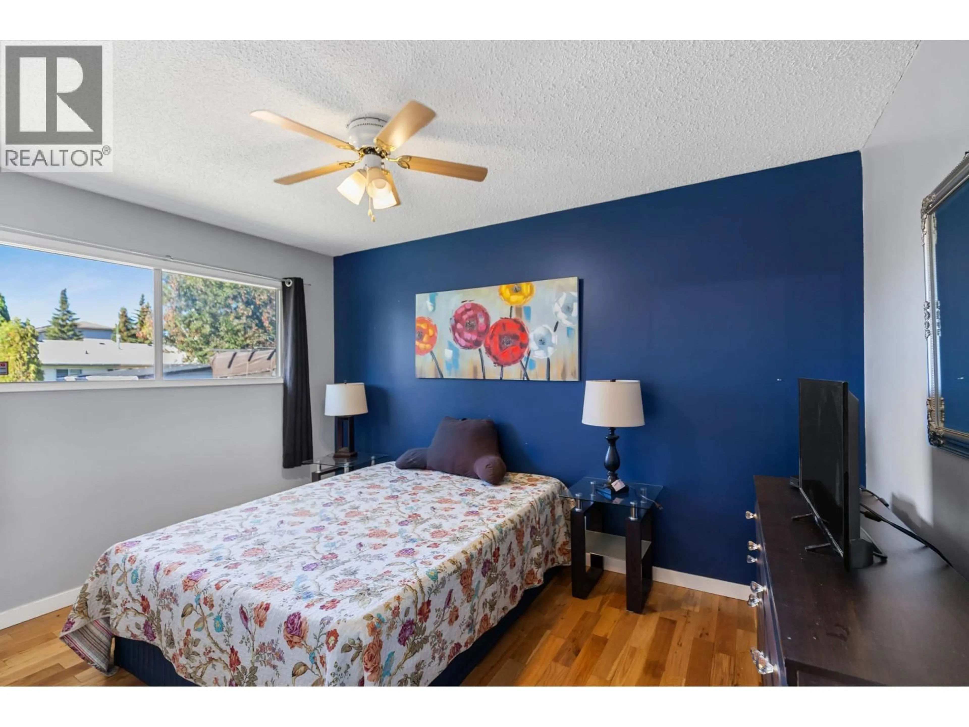 Bedroom with bed, wood/laminate floor for 3918 ENEMARK CRESCENT, Prince George British Columbia V2N2X5
