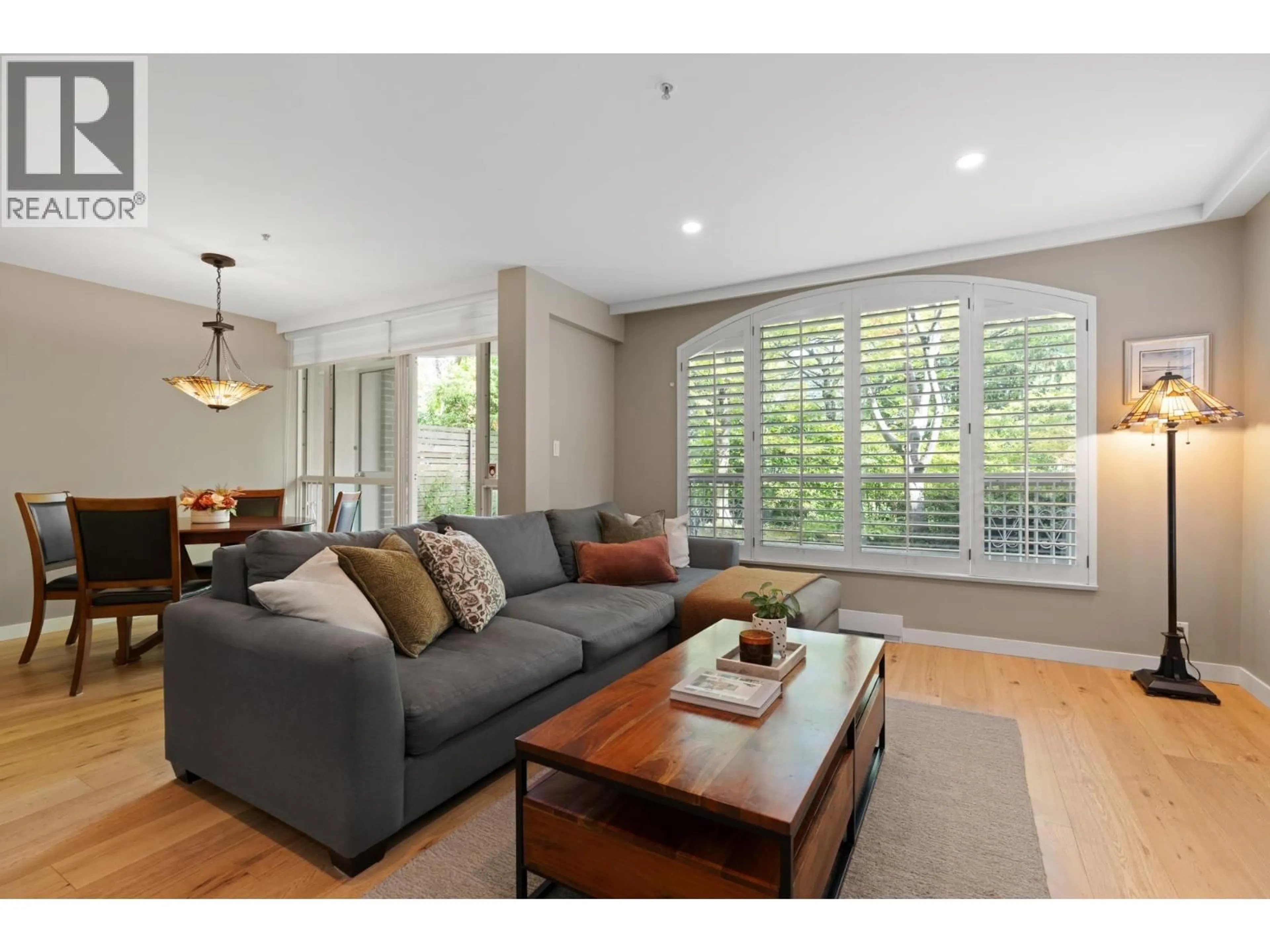 Living room with furniture, wood/laminate floor for 109 - 1111 HARO STREET, Vancouver British Columbia V6E1E3