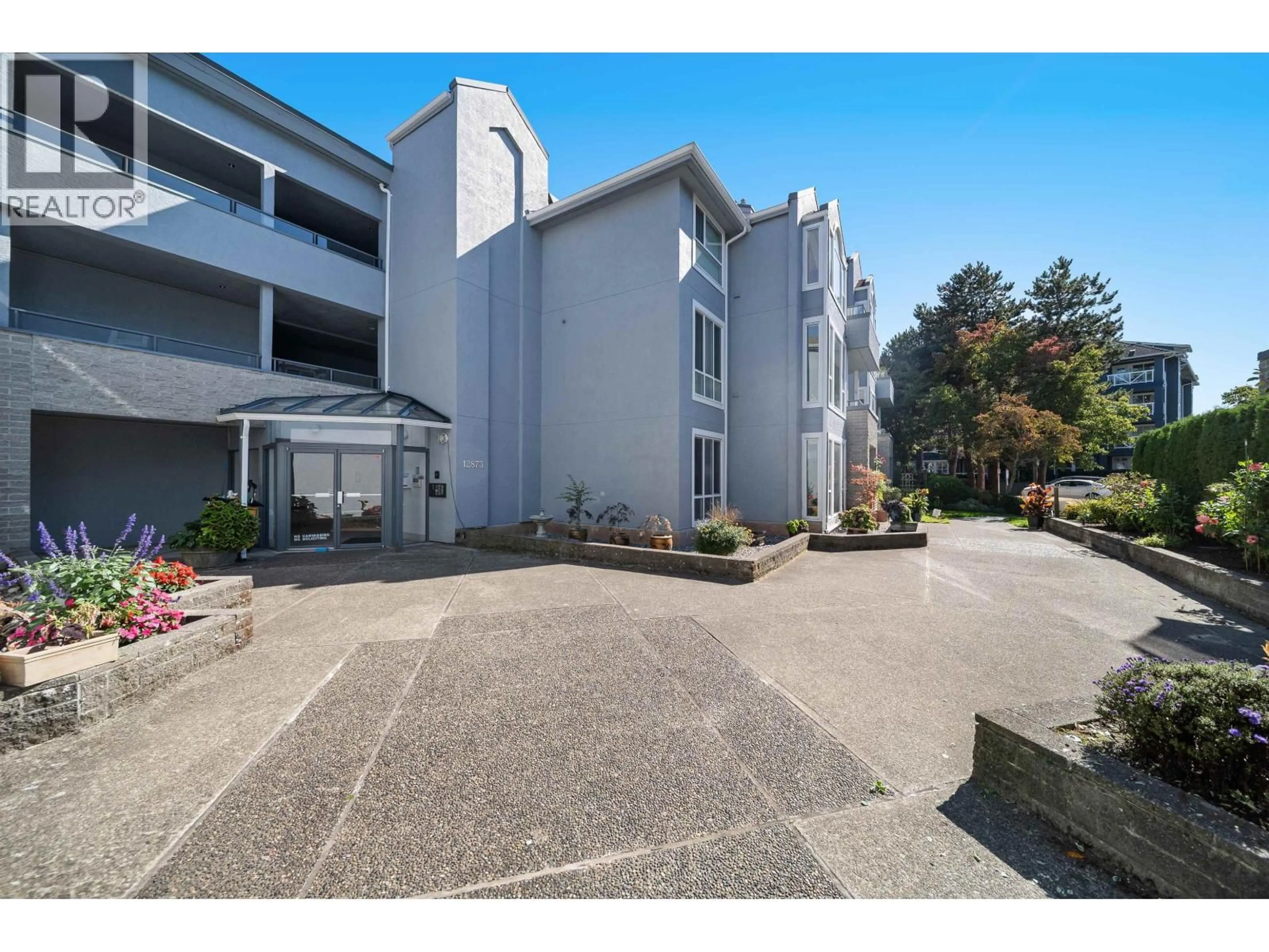 A pic from outside/outdoor area/front of a property/back of a property/a pic from drone, building for 121 - 12873 RAILWAY AVENUE, Richmond British Columbia V7E6K3