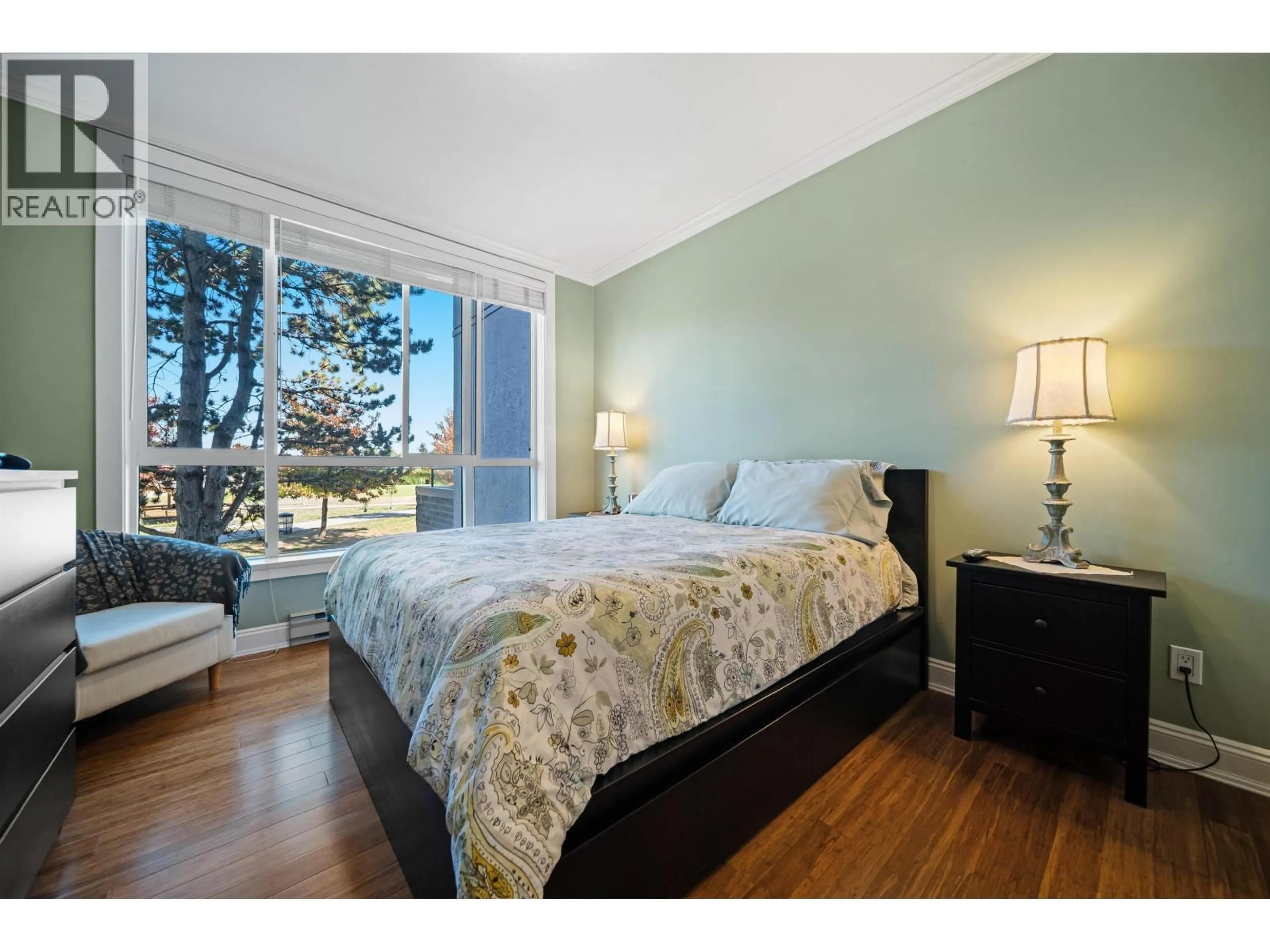 Bedroom with bed, wood/laminate floor for 121 - 12873 RAILWAY AVENUE, Richmond British Columbia V7E6K3