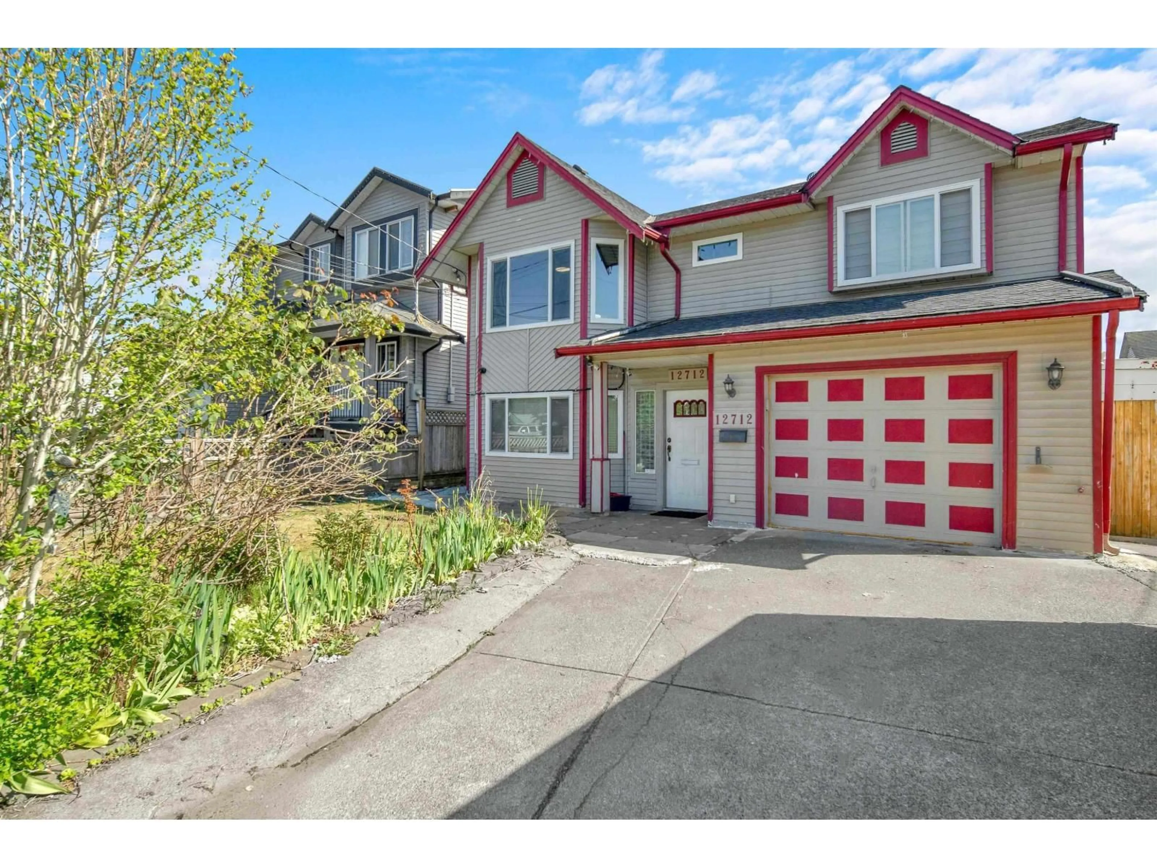 Home with vinyl exterior material, street for 12712 113A AVENUE, Surrey British Columbia V3V3M4