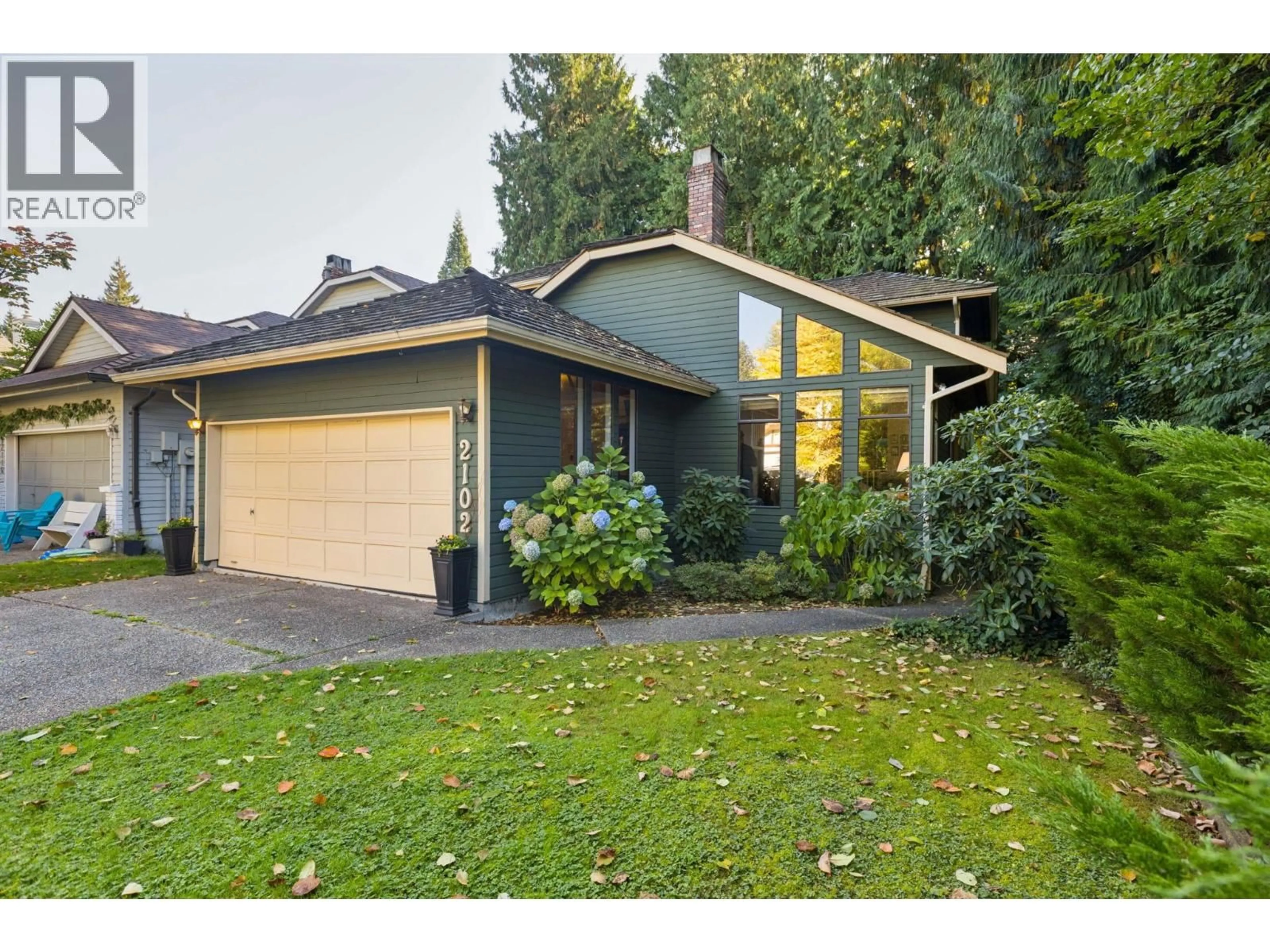 Home with vinyl exterior material, street for 2102 KIRKSTONE PLACE, North Vancouver British Columbia V7J3R1