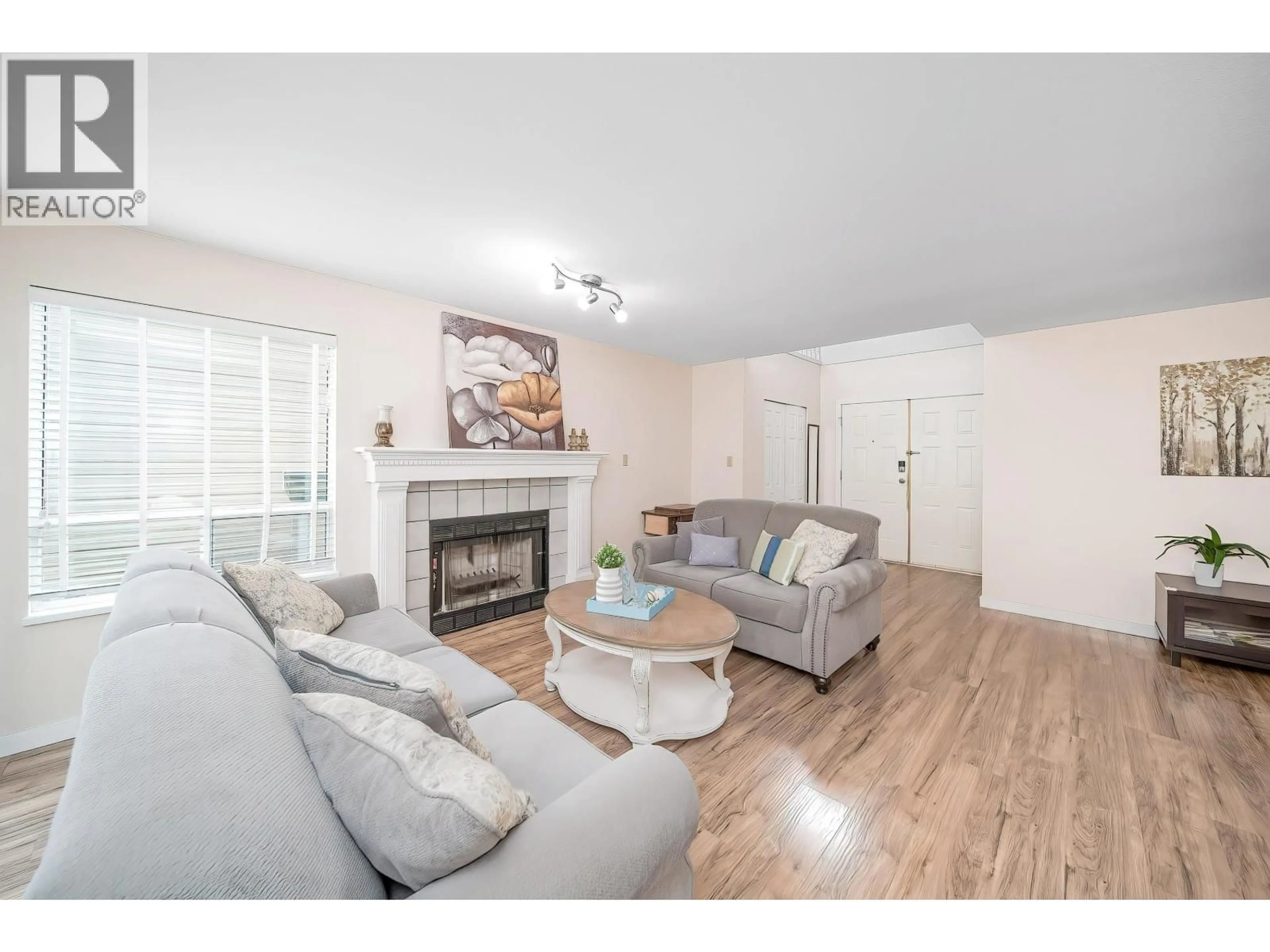Living room with furniture, wood/laminate floor for 1269 MICHIGAN DRIVE, Coquitlam British Columbia V3B6T7