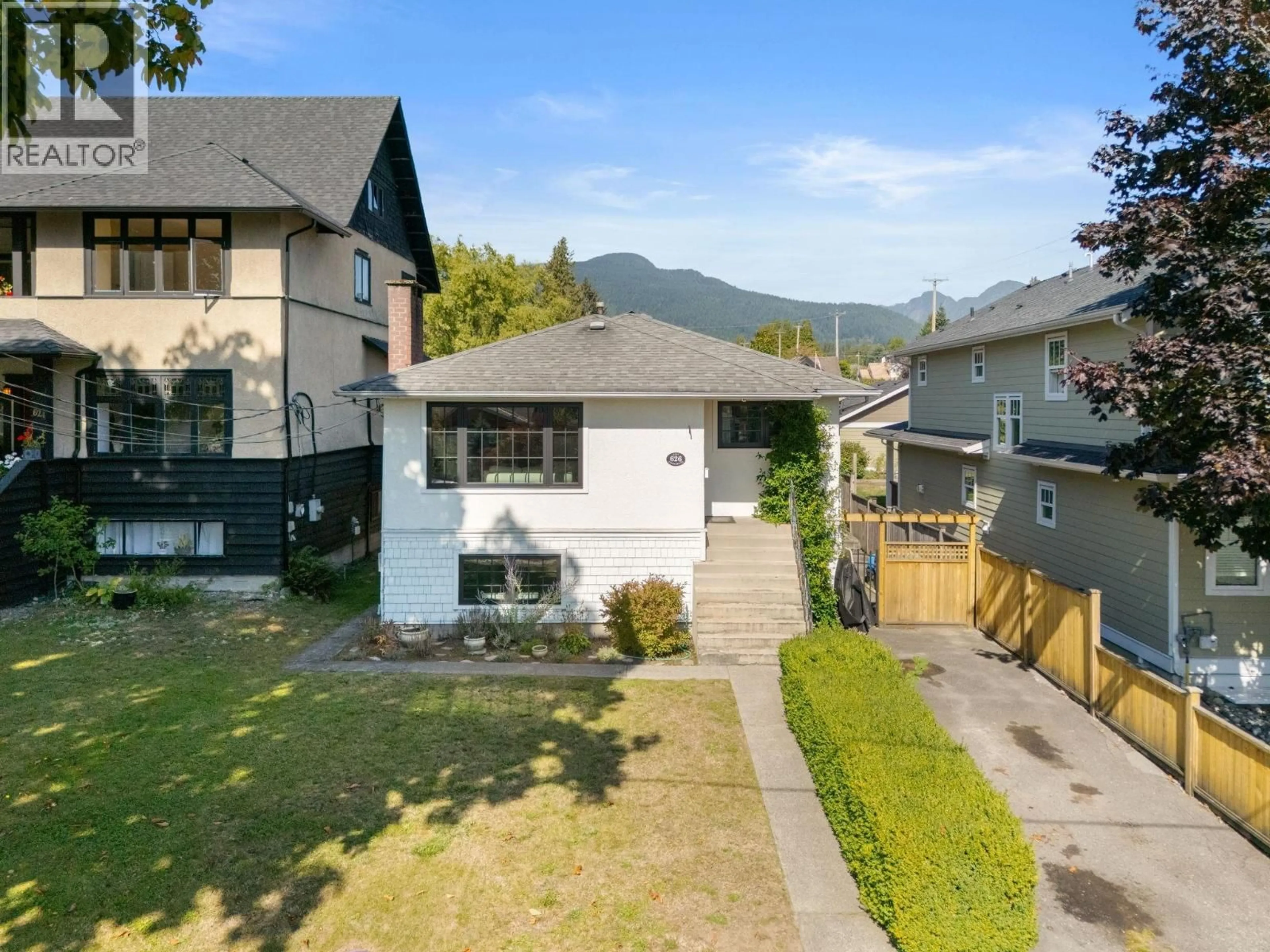 A pic from outside/outdoor area/front of a property/back of a property/a pic from drone, mountain view for 626 13TH STREET, North Vancouver British Columbia V7L2M5