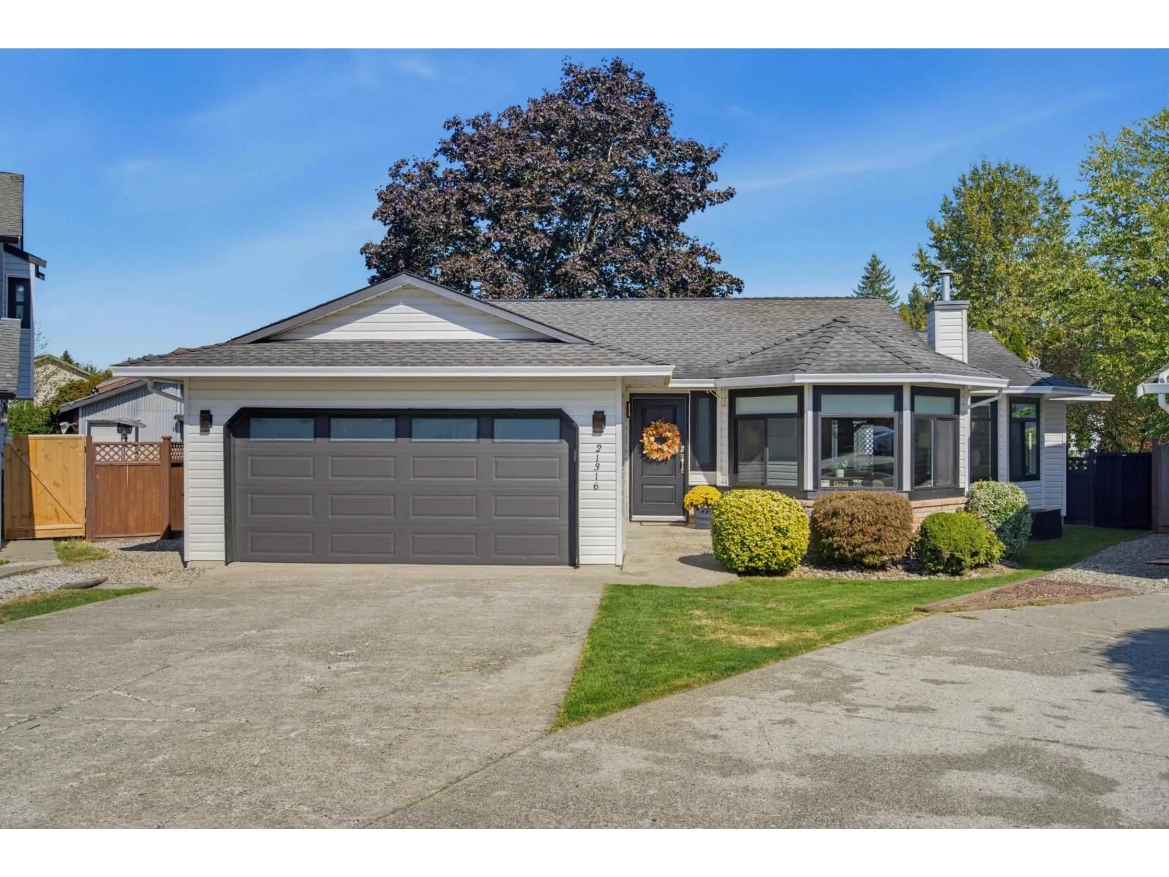 Home with vinyl exterior material, street for 21316 89A AVENUE, Langley British Columbia V1M1Z5