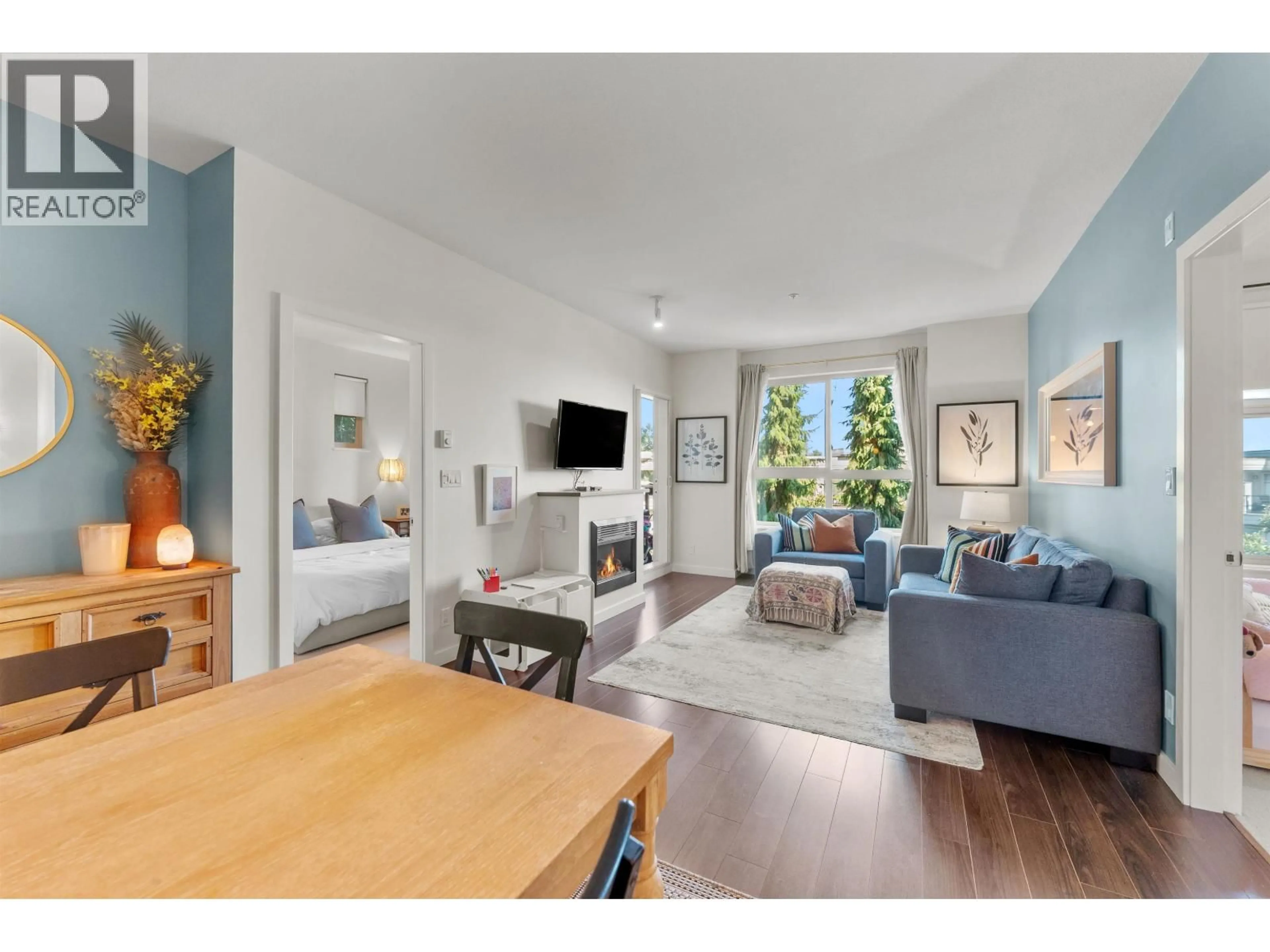 Living room with furniture, unknown for 203 - 255 ROSS DRIVE, New Westminster British Columbia V3L0C7