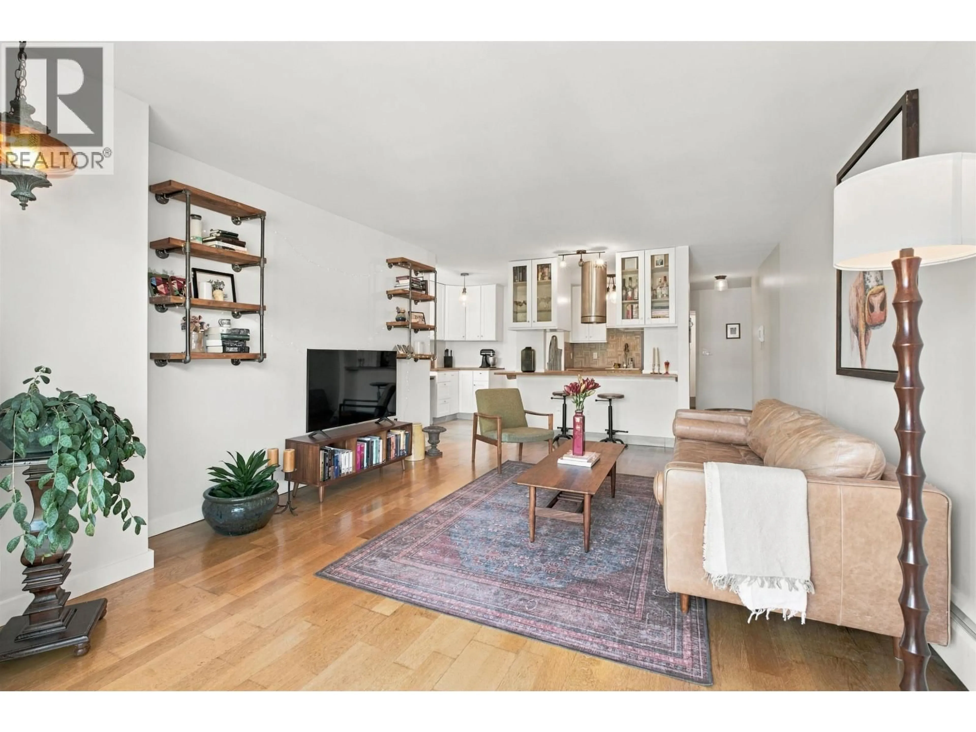 Living room with furniture, wood/laminate floor for 304 - 1611 3RD AVENUE, Vancouver British Columbia V5N1H1