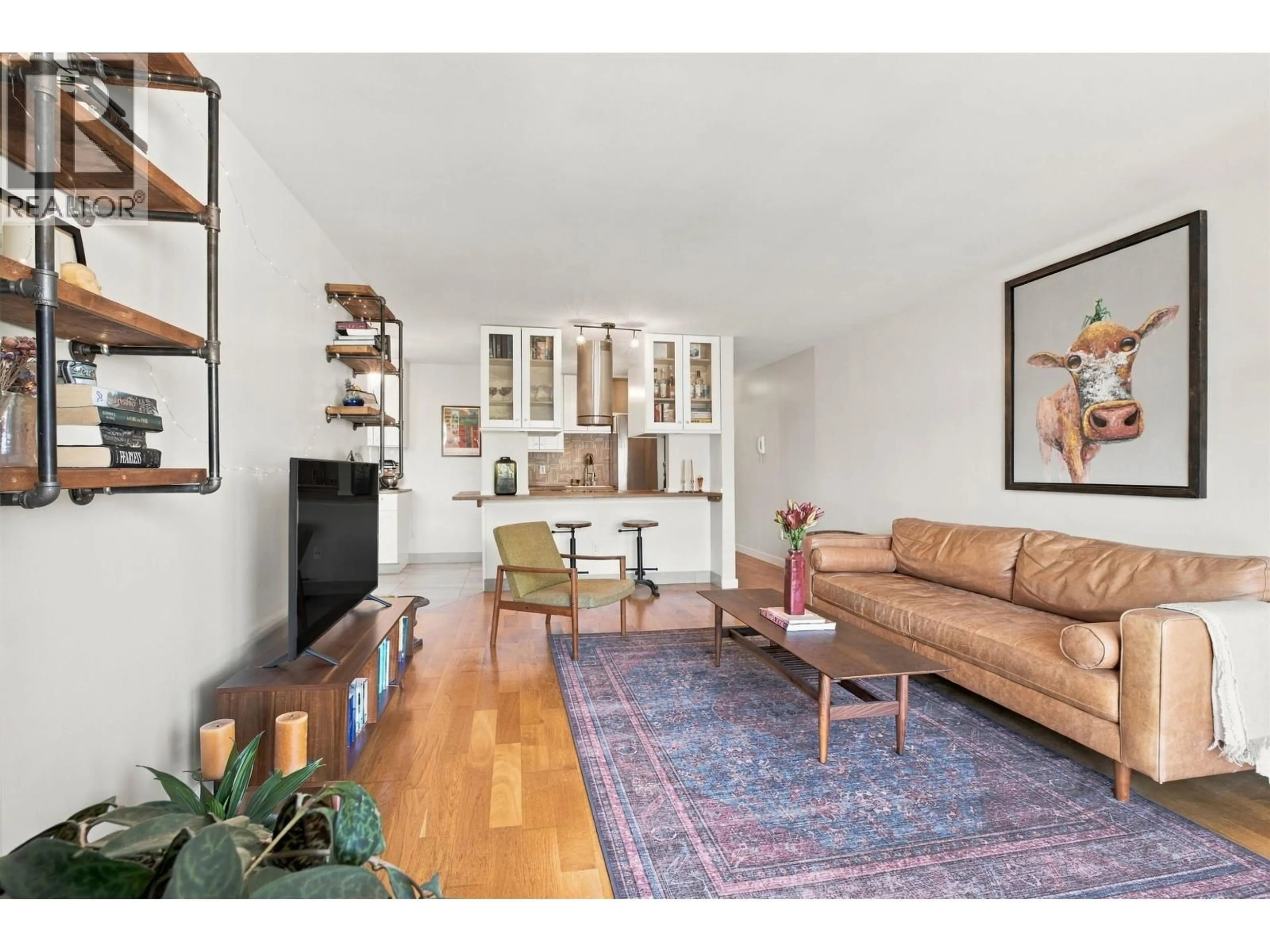 Living room with furniture, wood/laminate floor for 304 - 1611 3RD AVENUE, Vancouver British Columbia V5N1H1