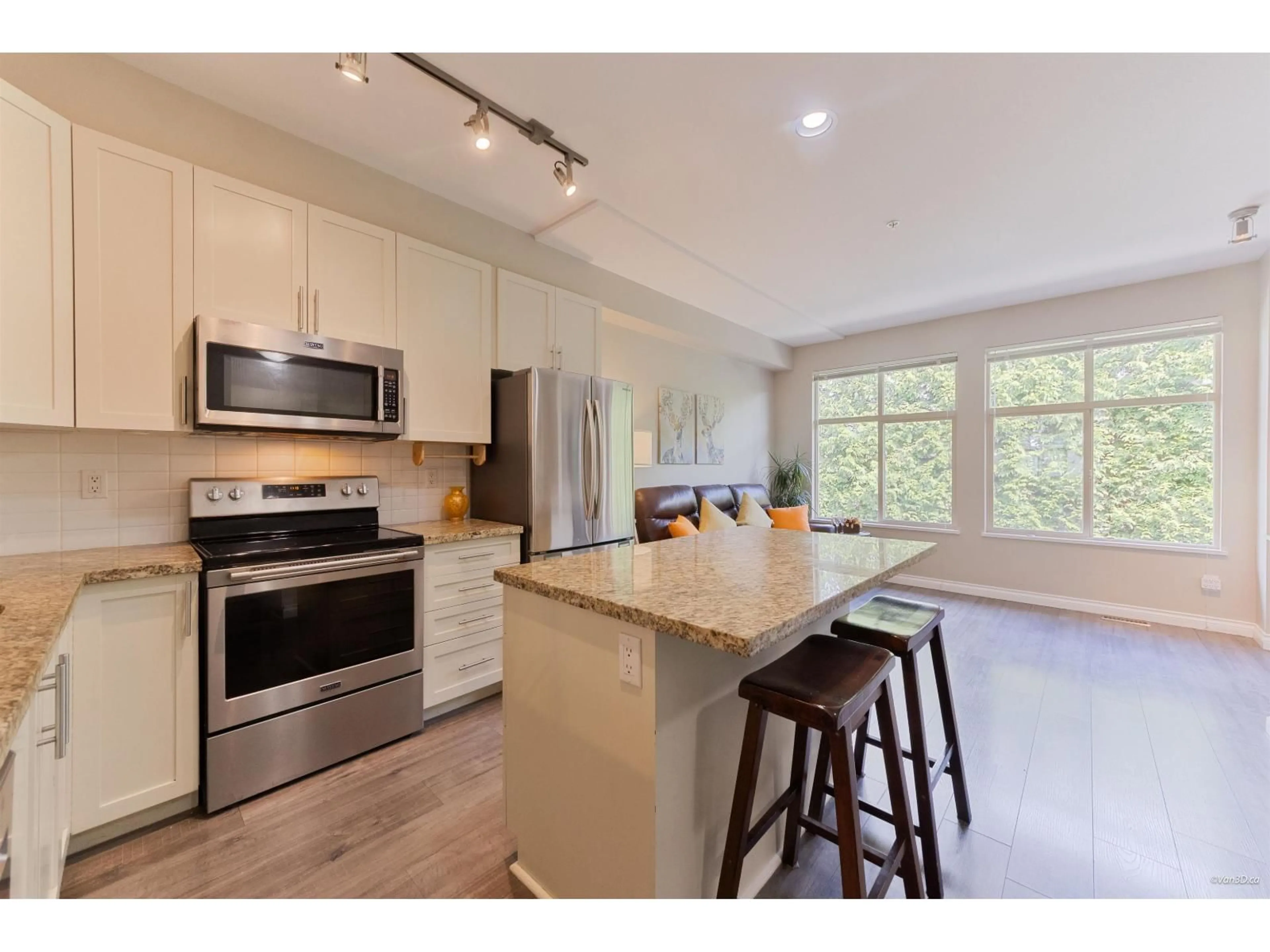 Open concept kitchen, wood/laminate floor for 38 - 21661 88 AVENUE, Langley British Columbia V1M4E6