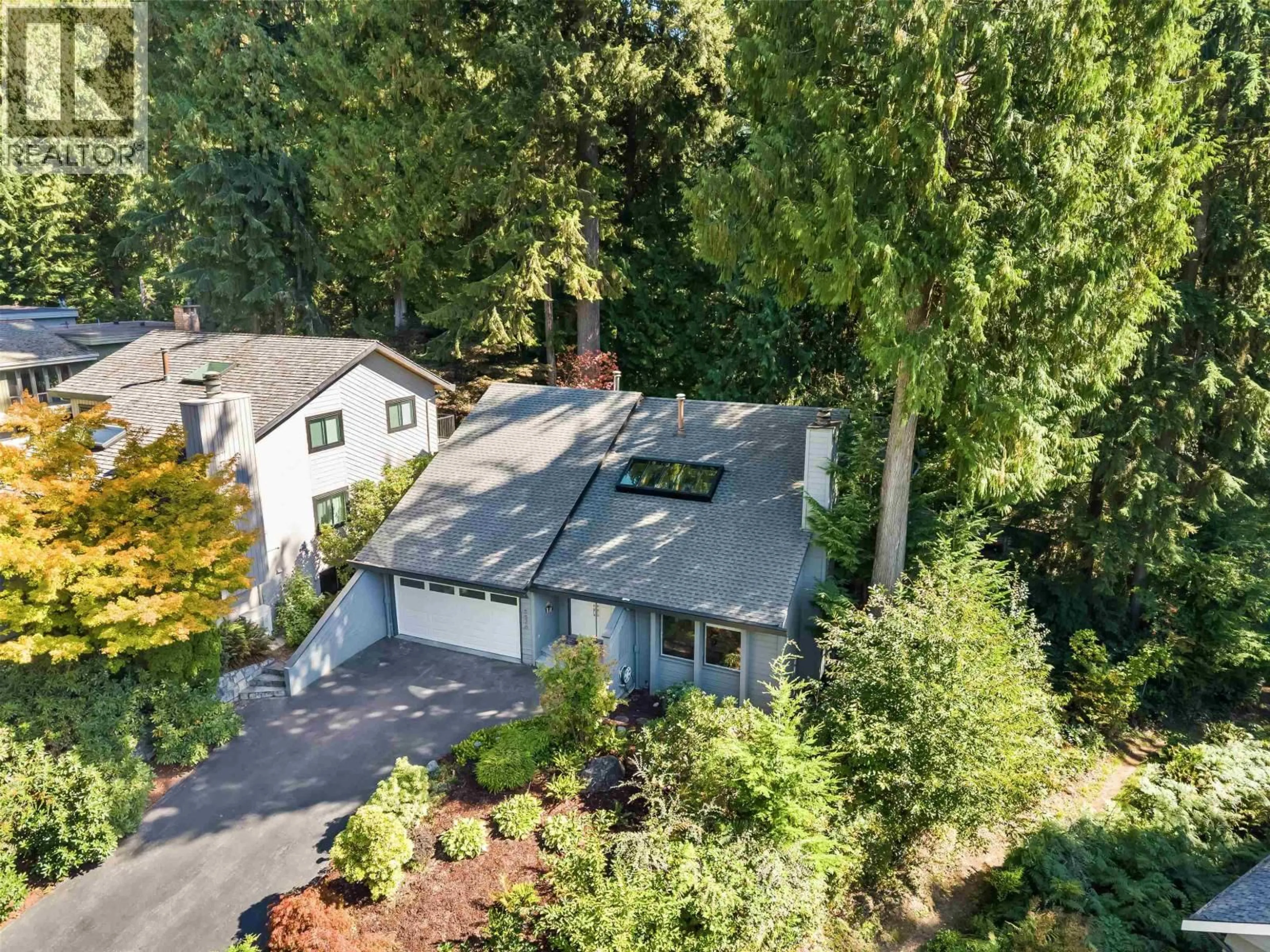 A pic from outside/outdoor area/front of a property/back of a property/a pic from drone, street for 5520 HUCKLEBERRY LANE, North Vancouver British Columbia V7R4N8
