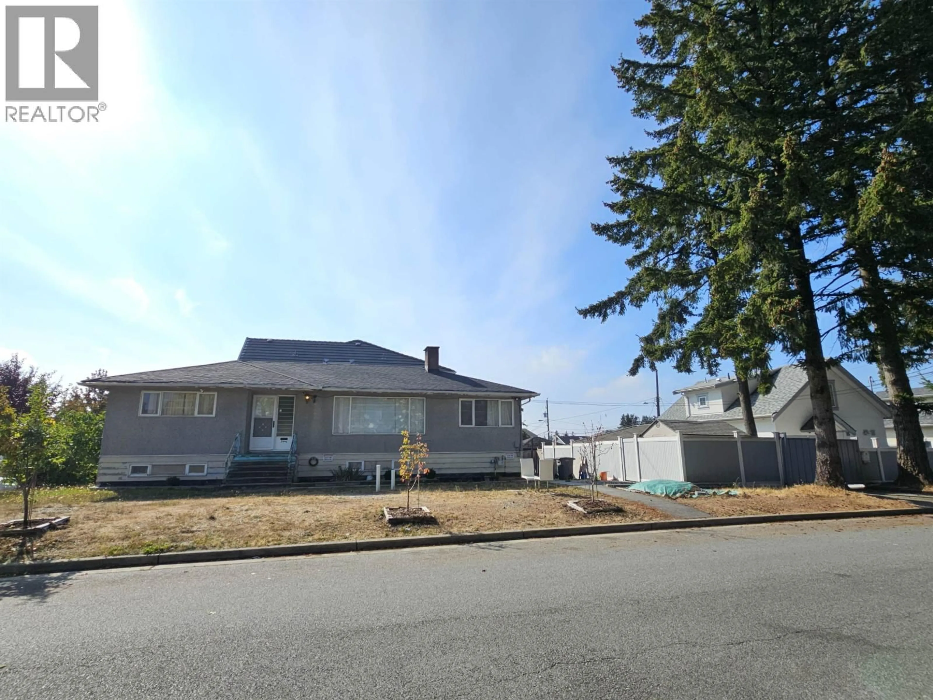 A pic from outside/outdoor area/front of a property/back of a property/a pic from drone, street for 2946 52ND AVENUE, Vancouver British Columbia V5S1T3