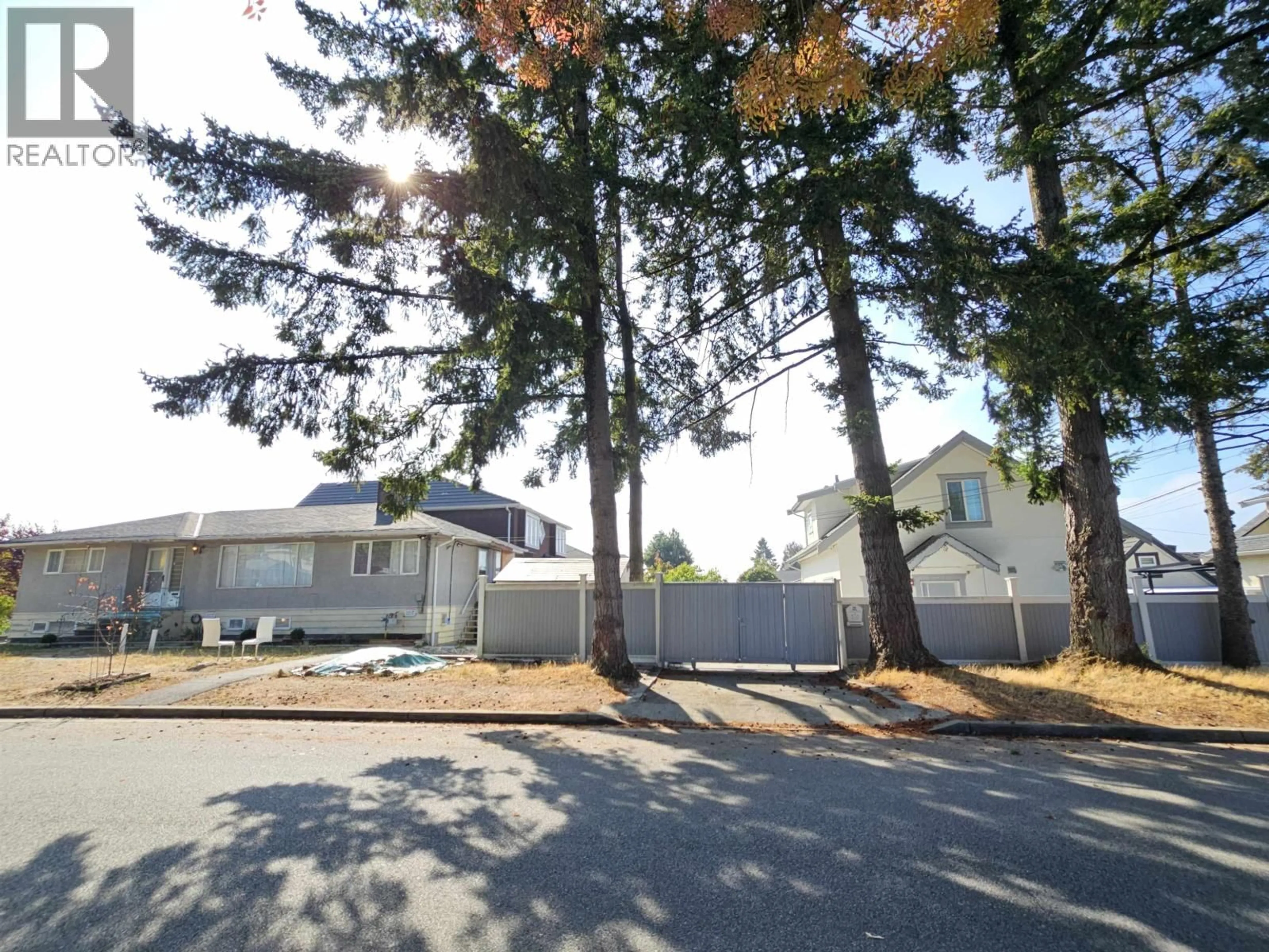 A pic from outside/outdoor area/front of a property/back of a property/a pic from drone, street for 2946 52ND AVENUE, Vancouver British Columbia V5S1T3