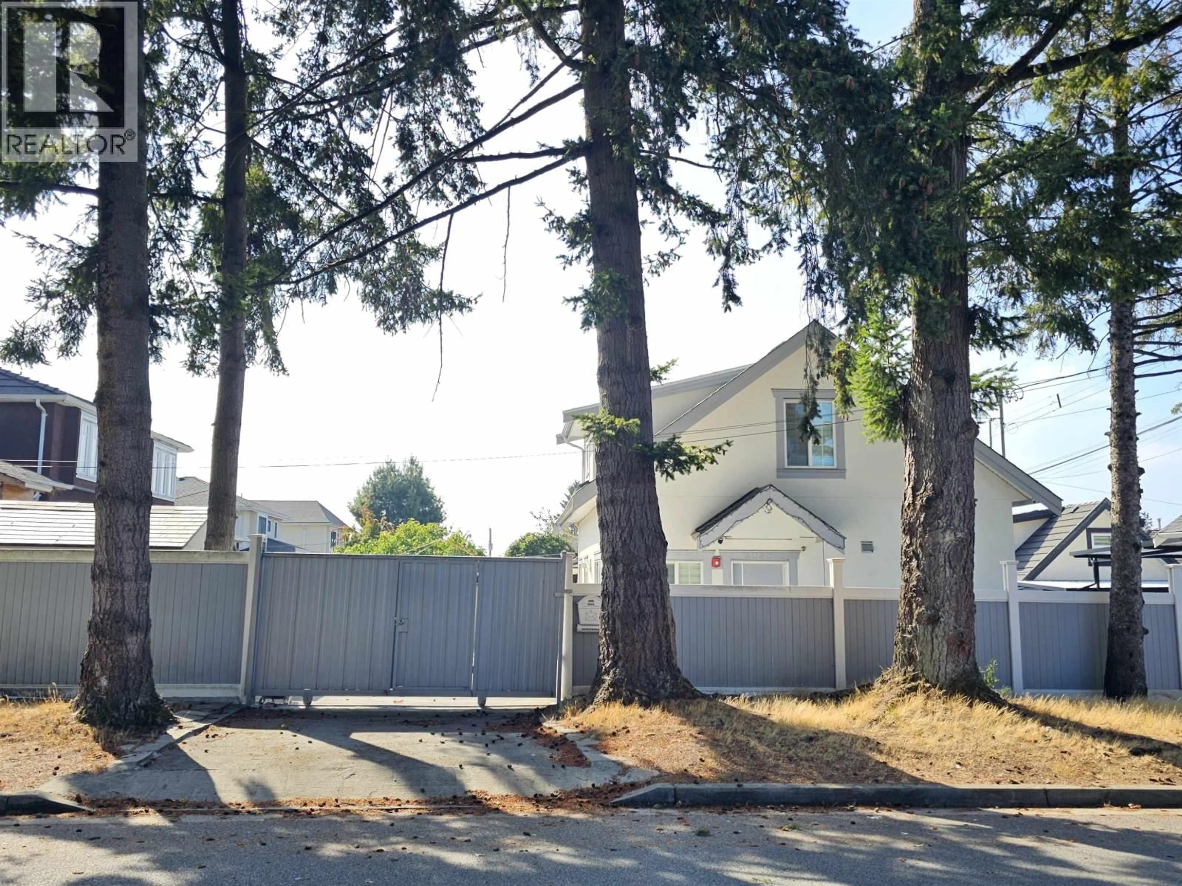 A pic from outside/outdoor area/front of a property/back of a property/a pic from drone, street for 2946 52ND AVENUE, Vancouver British Columbia V5S1T3