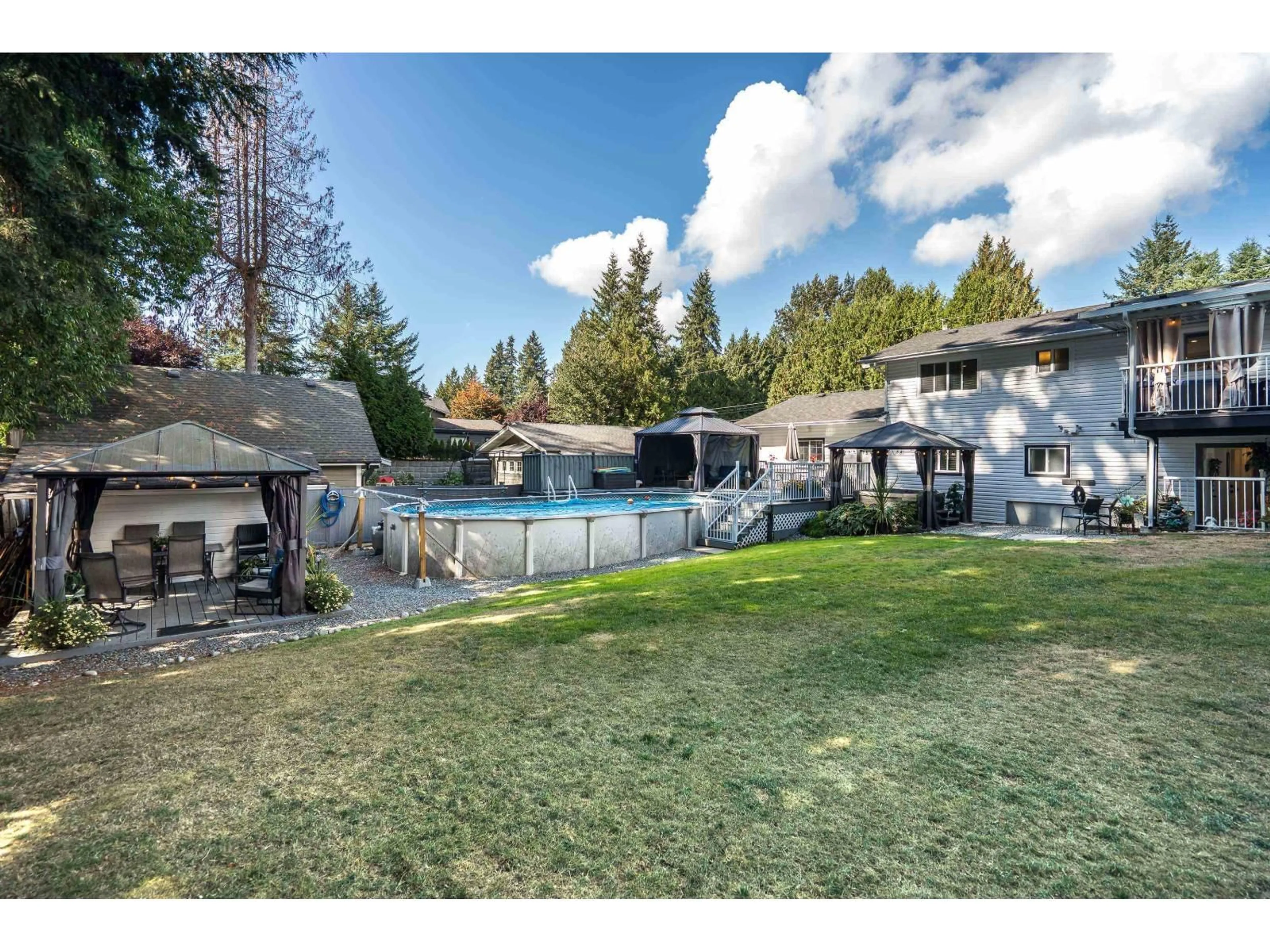 A pic from outside/outdoor area/front of a property/back of a property/a pic from drone, water/lake/river/ocean view for 20504 43 AVENUE, Langley British Columbia V3A3C2