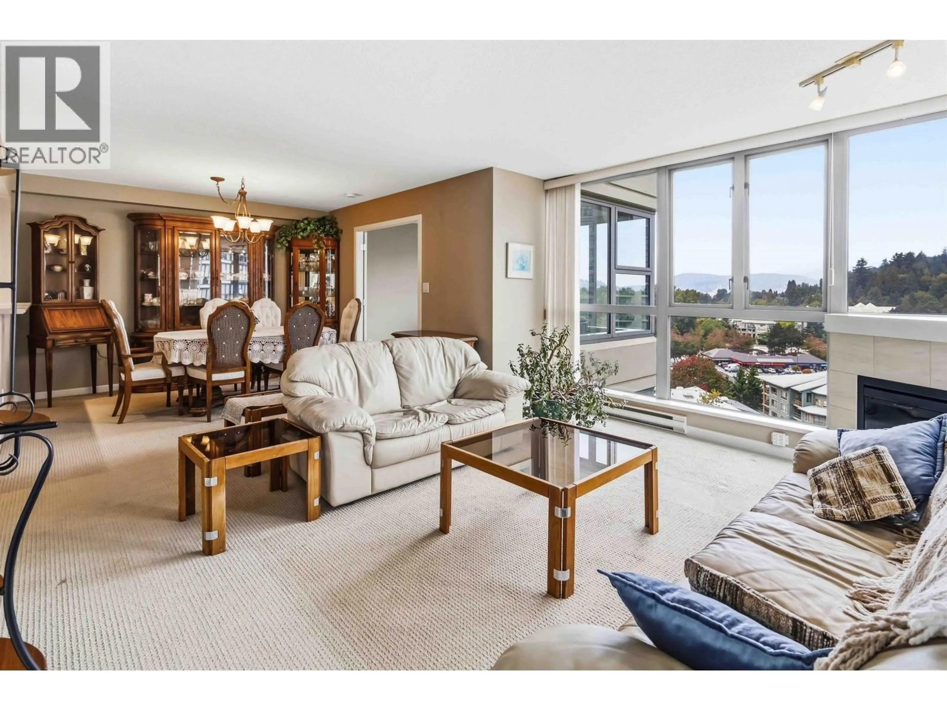 Living room with furniture, unknown for 1006 - 295 GUILDFORD WAY, Port Moody British Columbia V3H5N3