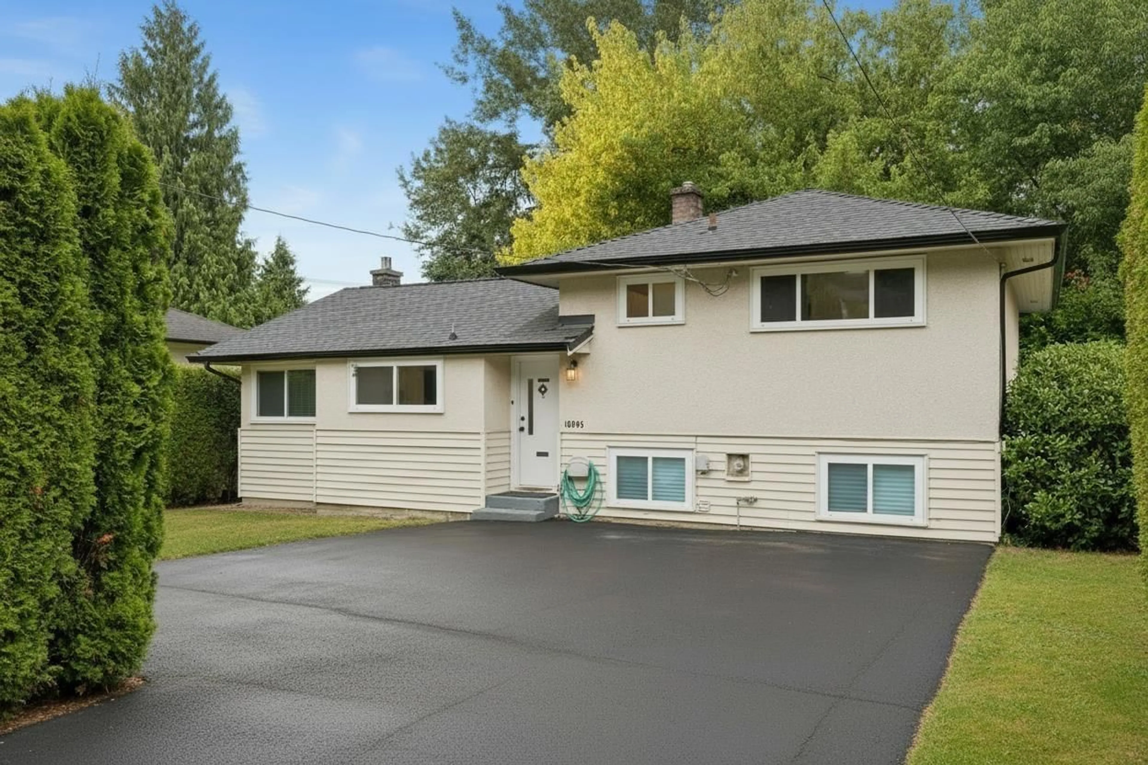 Home with vinyl exterior material, street for 10996 MCADAM ROAD, Delta British Columbia V4C3E8