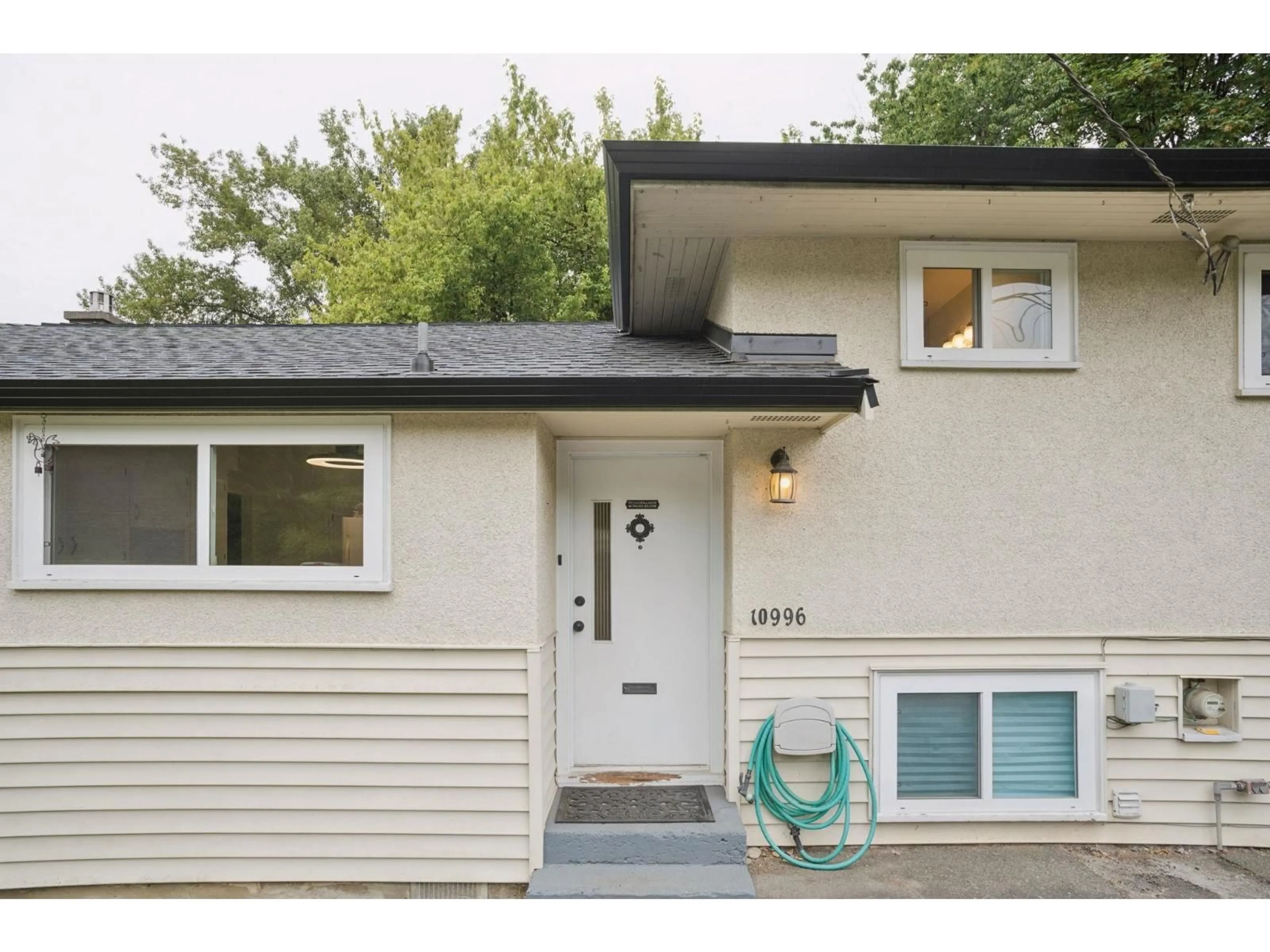 Home with vinyl exterior material, street for 10996 MCADAM ROAD, Delta British Columbia V4C3E8