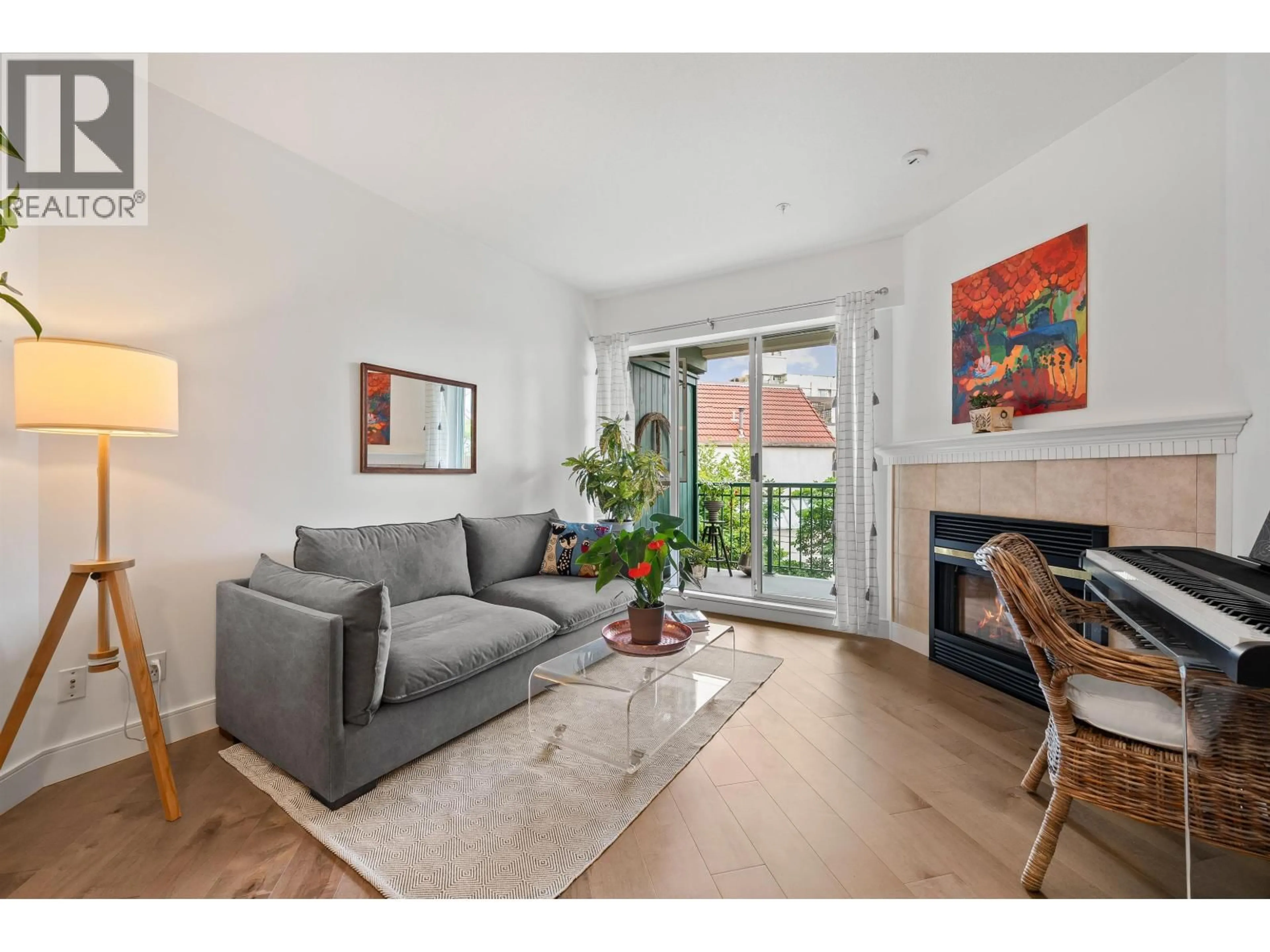 Living room with furniture, wood/laminate floor for 304 - 1928 NELSON STREET, Vancouver British Columbia V6G1N2
