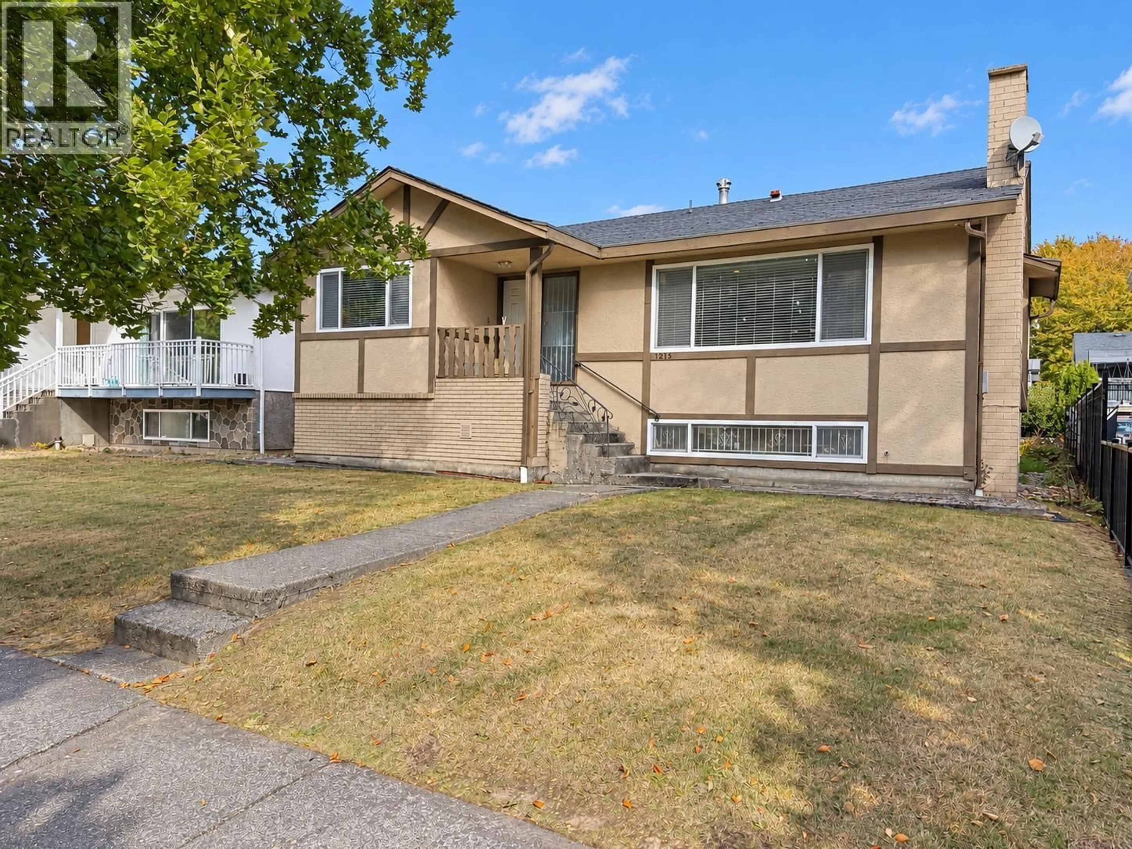 Home with vinyl exterior material, street for 1215 48TH AVENUE, Vancouver British Columbia V5W2E8