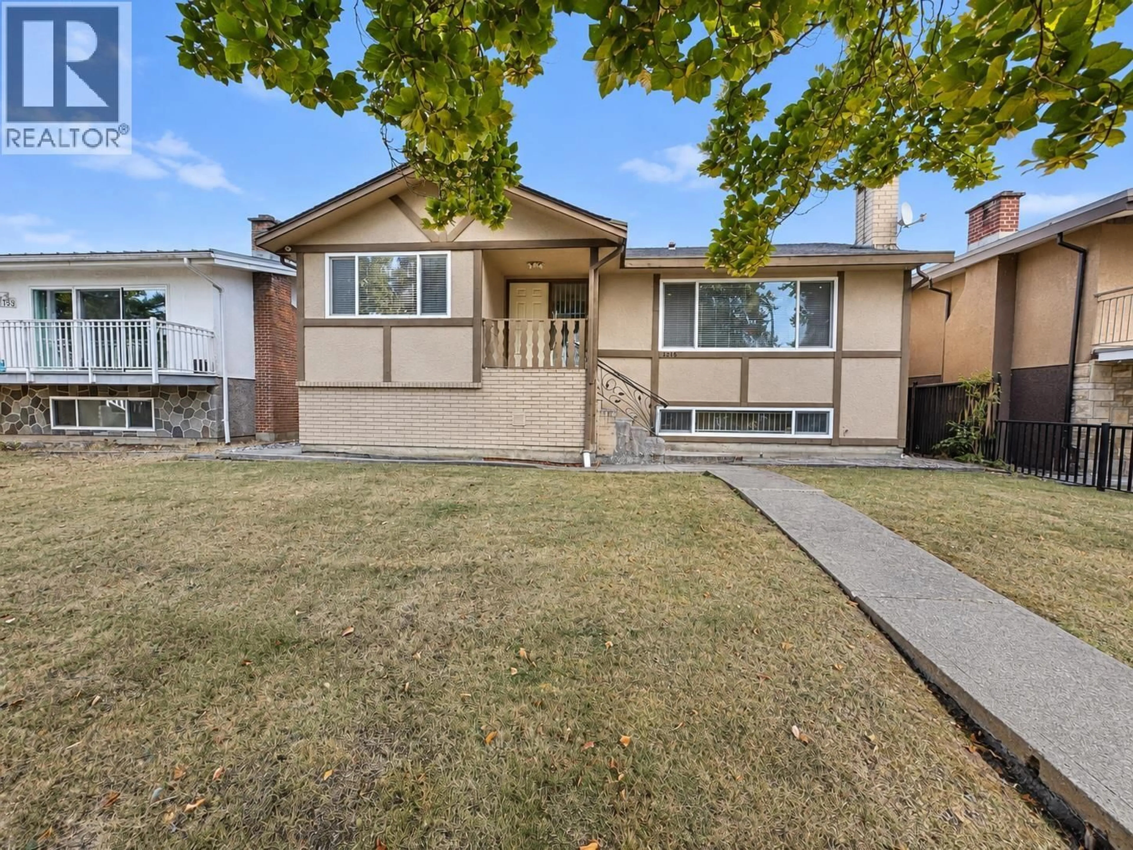 Home with vinyl exterior material, street for 1215 48TH AVENUE, Vancouver British Columbia V5W2E8