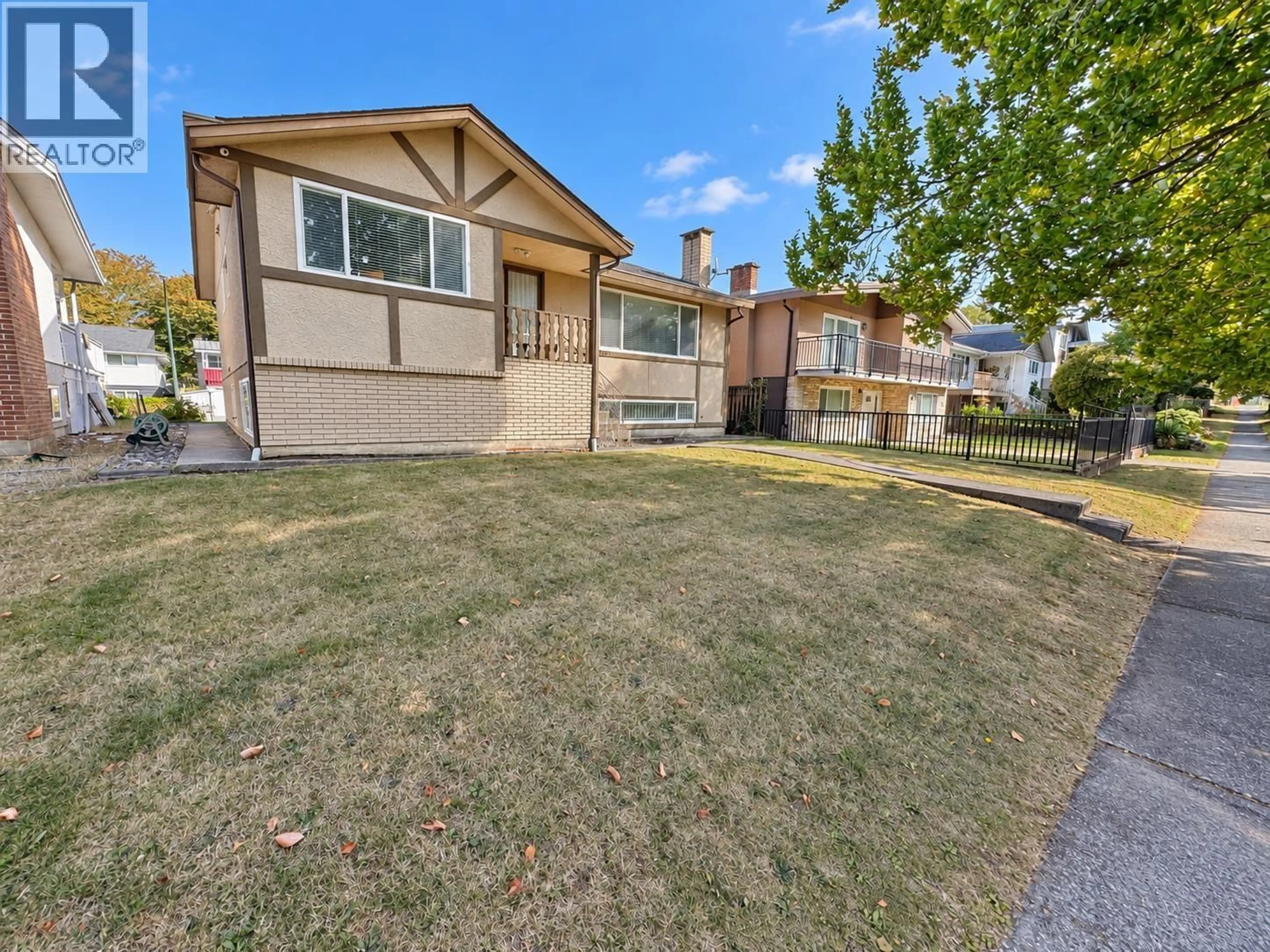 Home with vinyl exterior material, street for 1215 48TH AVENUE, Vancouver British Columbia V5W2E8