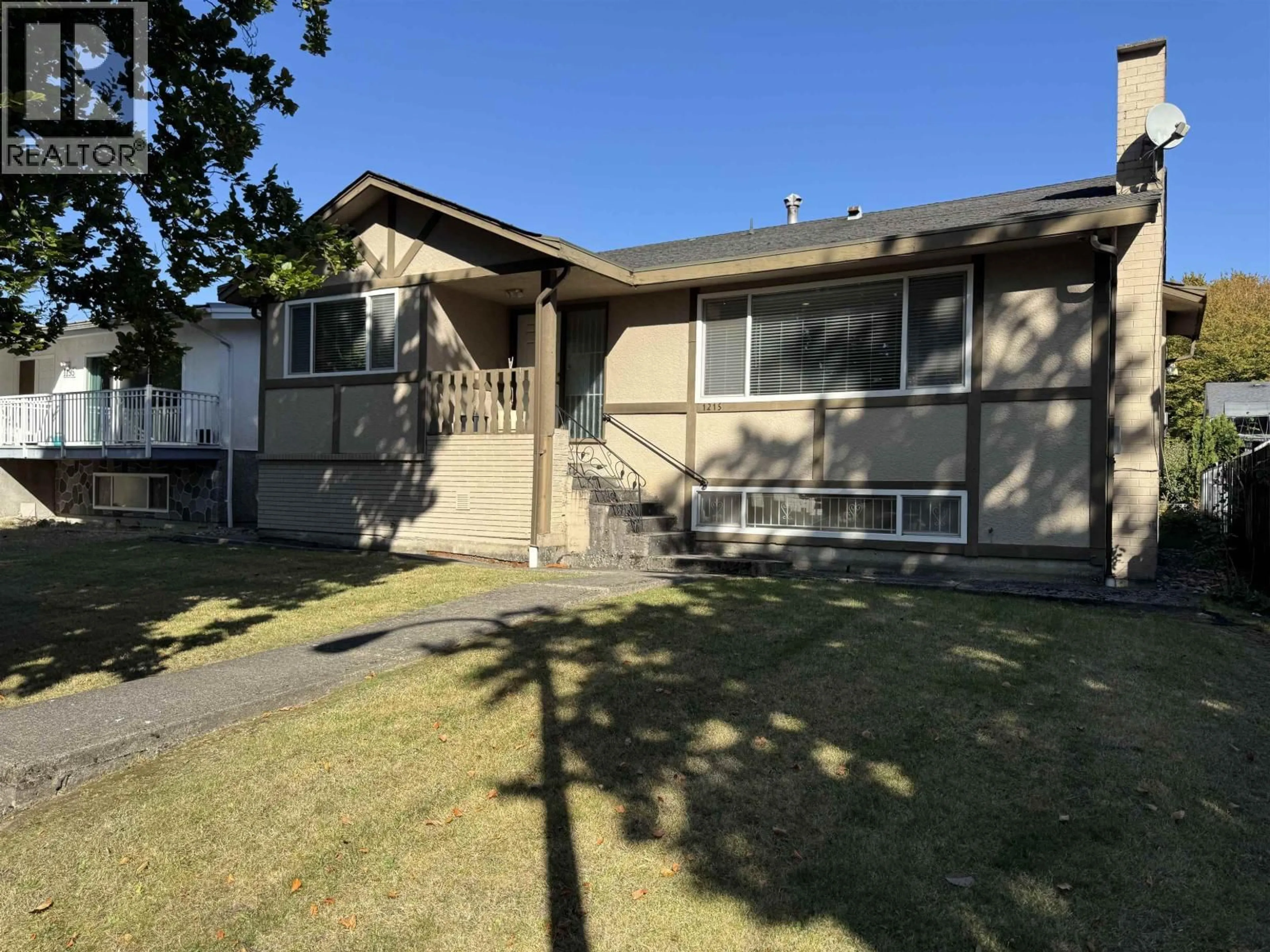 Home with vinyl exterior material, street for 1215 48TH AVENUE, Vancouver British Columbia V5W2E8
