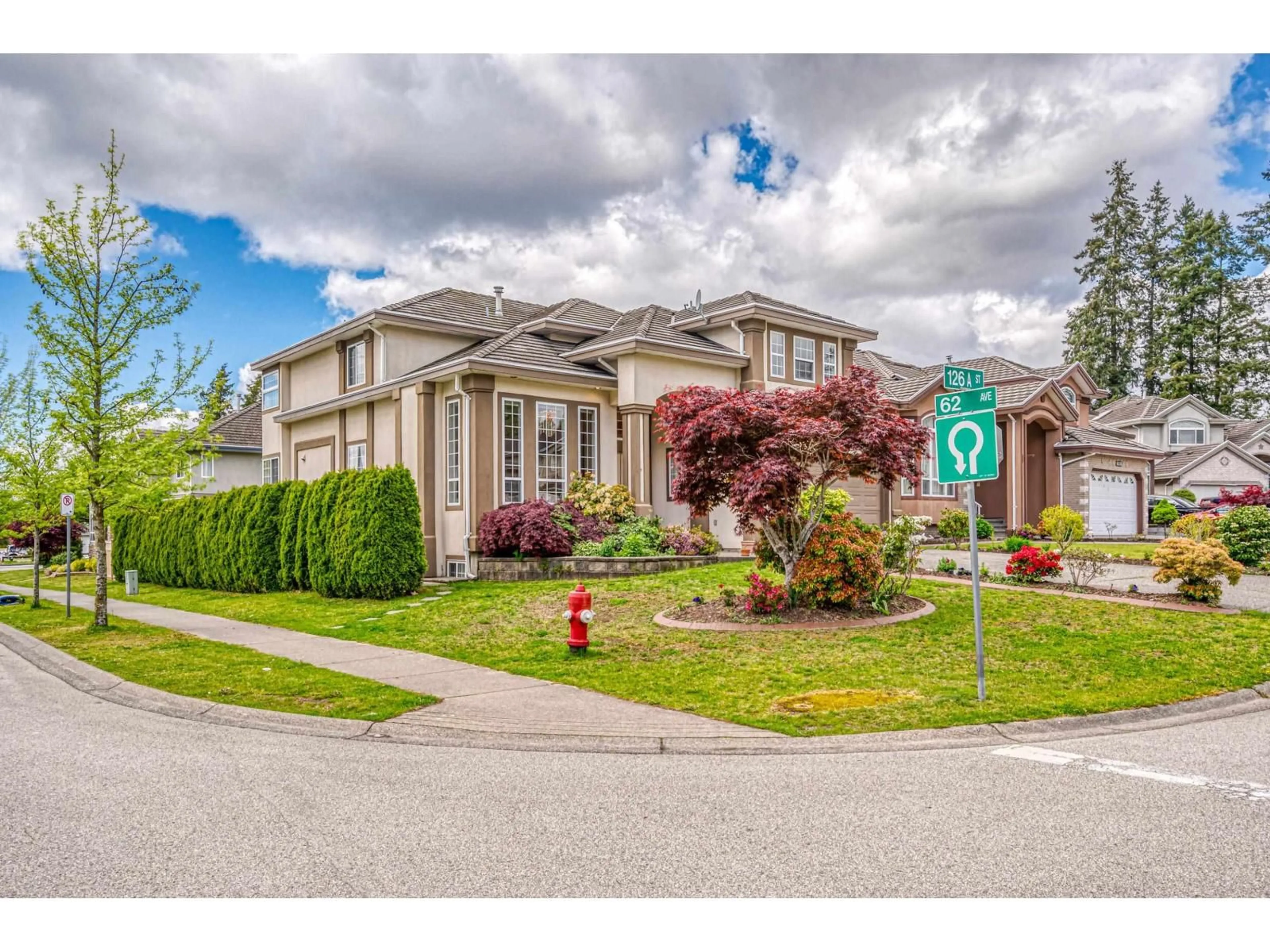 Home with vinyl exterior material, street for 6205 126A AVENUE, Surrey British Columbia V3X3M4