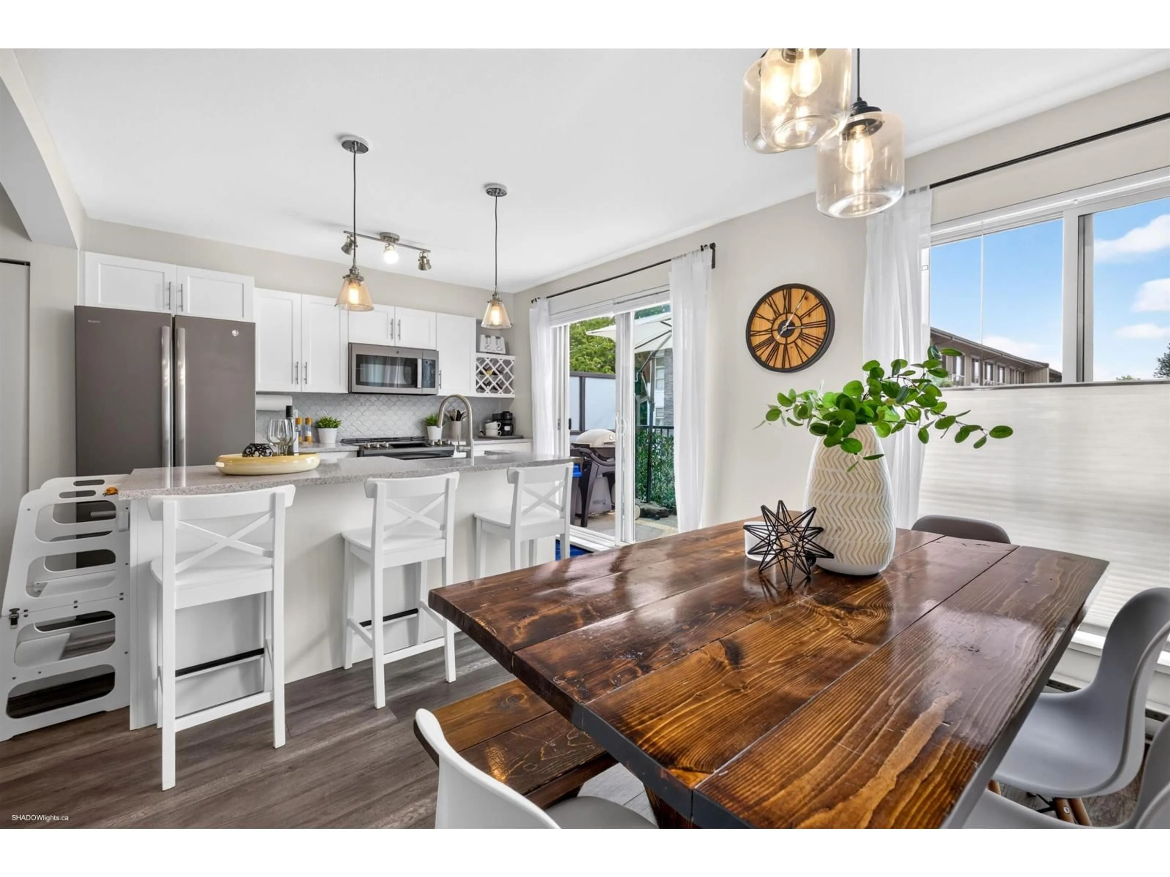 Open concept kitchen, wood/laminate floor for 145 - 6671 121 STREET, Surrey British Columbia V3W1T9