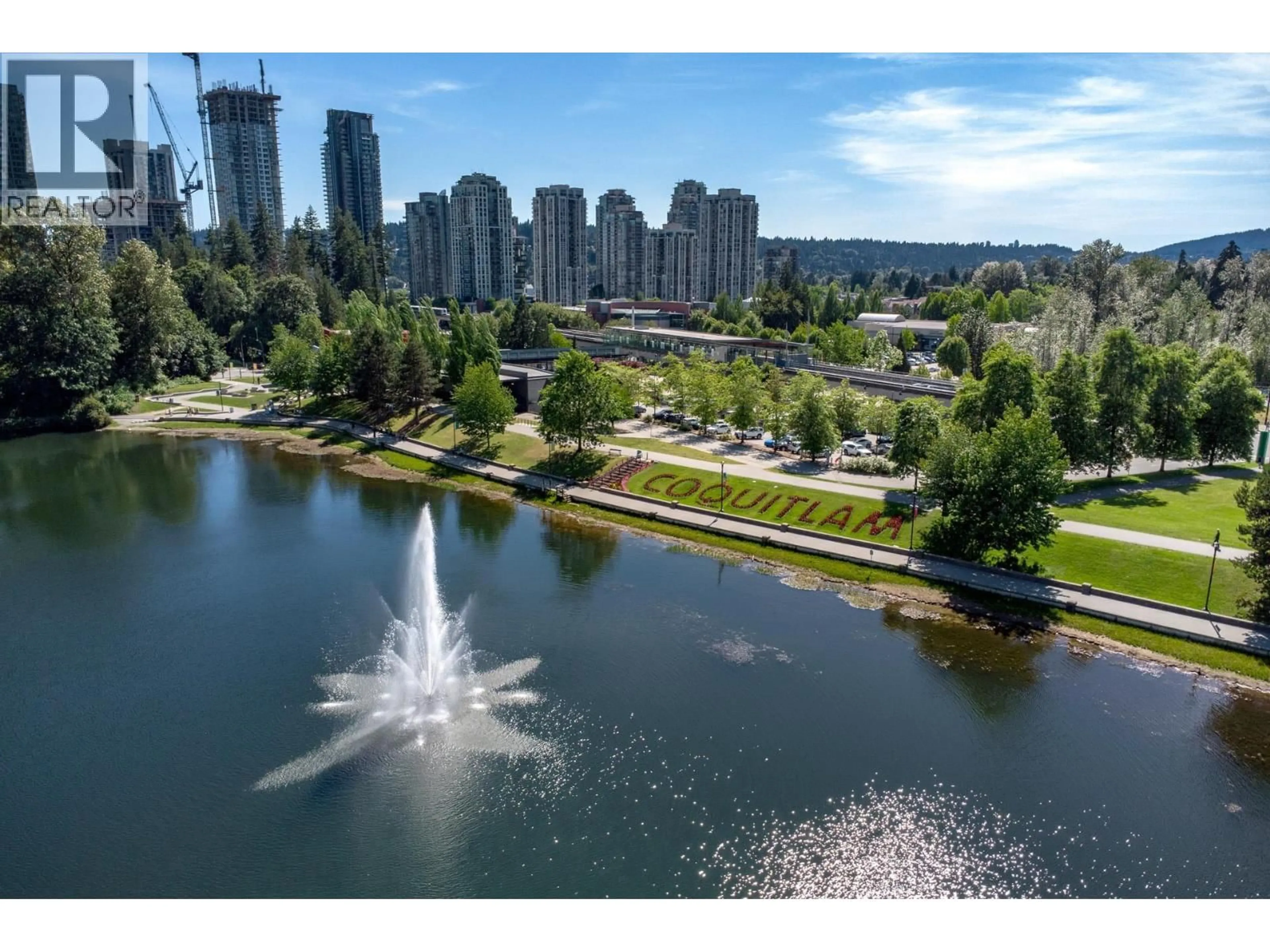 A pic from outside/outdoor area/front of a property/back of a property/a pic from drone, water/lake/river/ocean view for 214 - 1242 TOWN CENTRE BOULEVARD, Coquitlam British Columbia V3B7R6