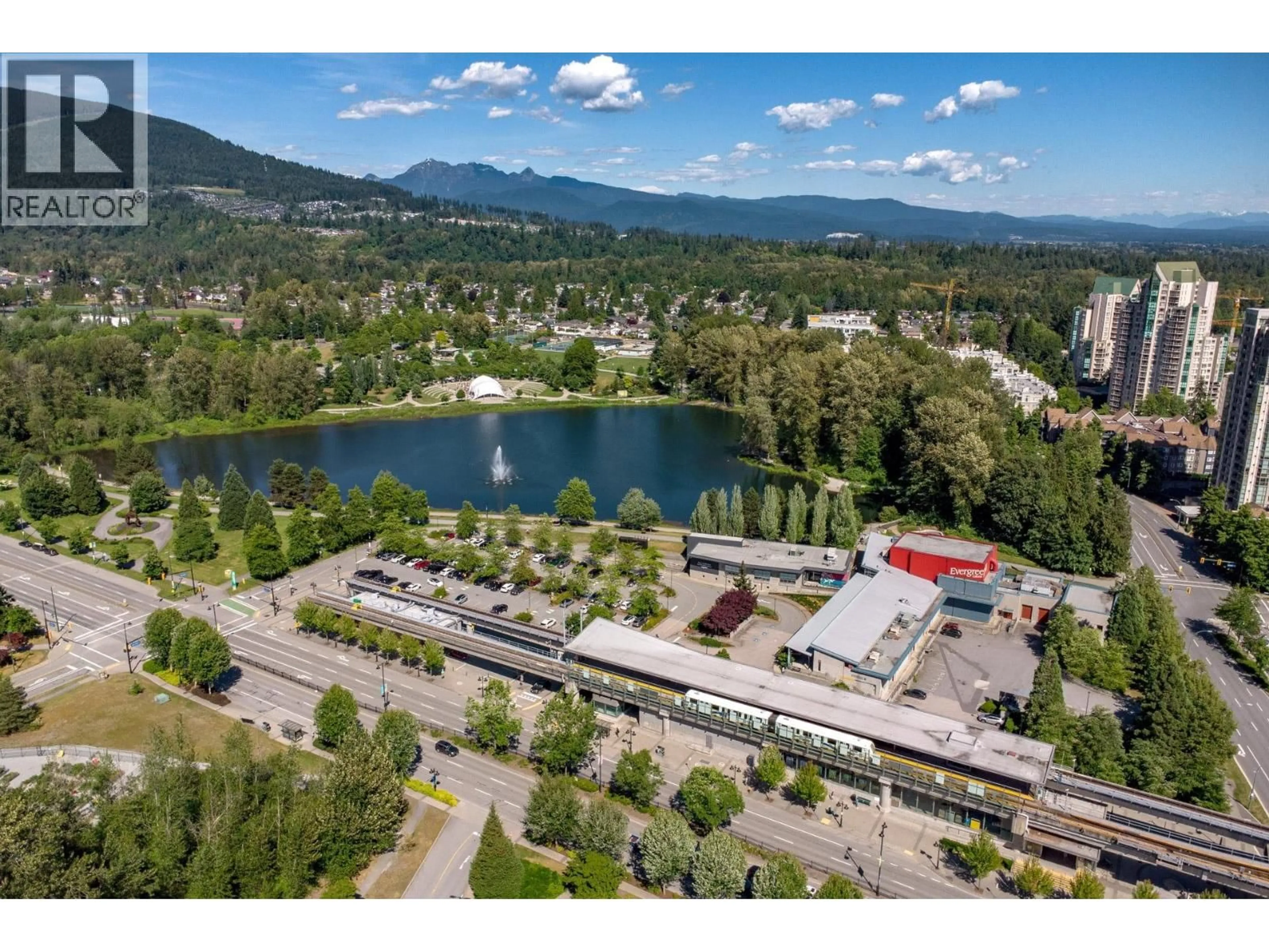 A pic from outside/outdoor area/front of a property/back of a property/a pic from drone, mountain view for 214 - 1242 TOWN CENTRE BOULEVARD, Coquitlam British Columbia V3B7R6