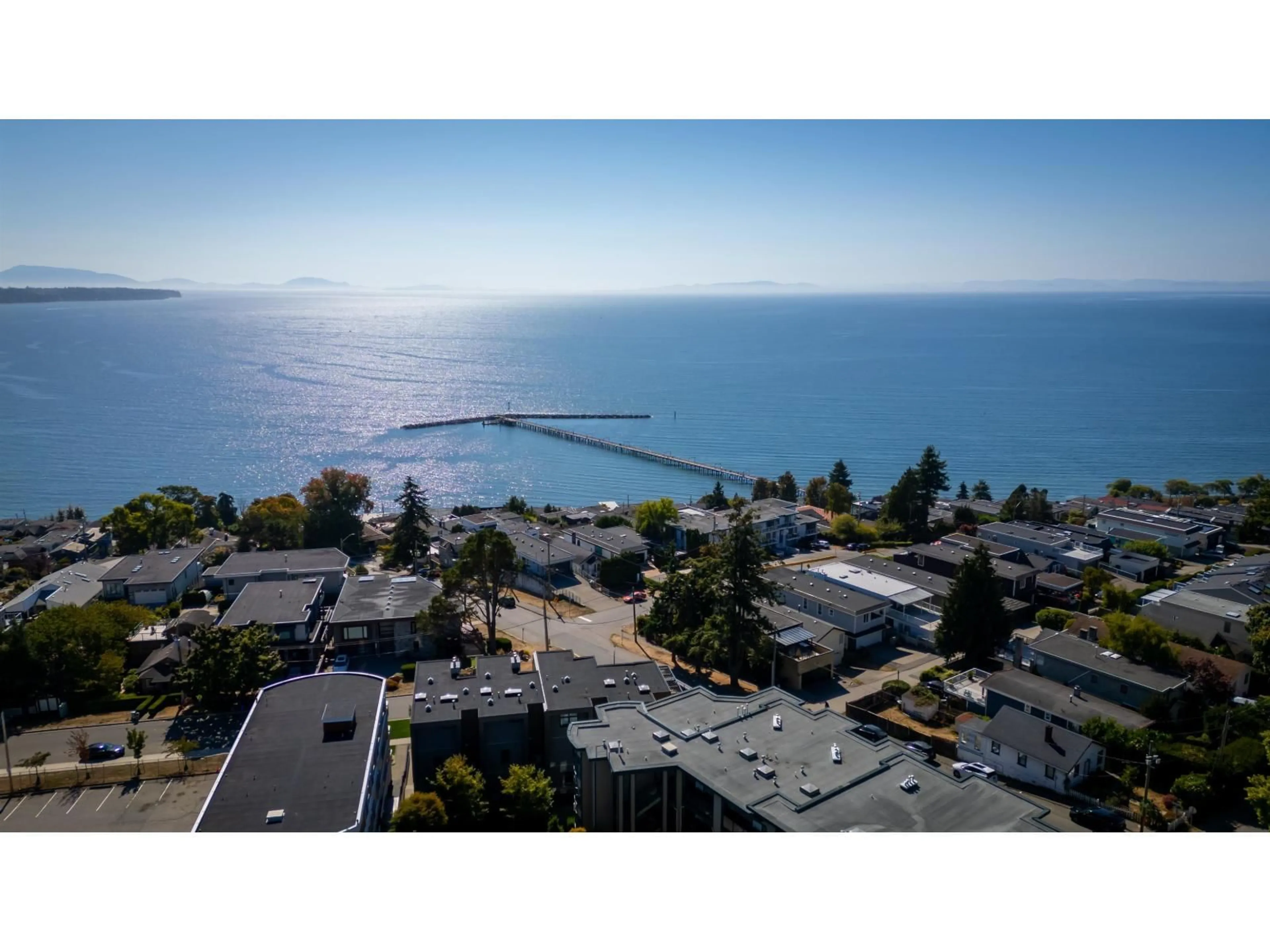 A pic from outside/outdoor area/front of a property/back of a property/a pic from drone, water/lake/river/ocean view for 306 - 15233 PACIFIC AVENUE, White Rock British Columbia V4B1P8