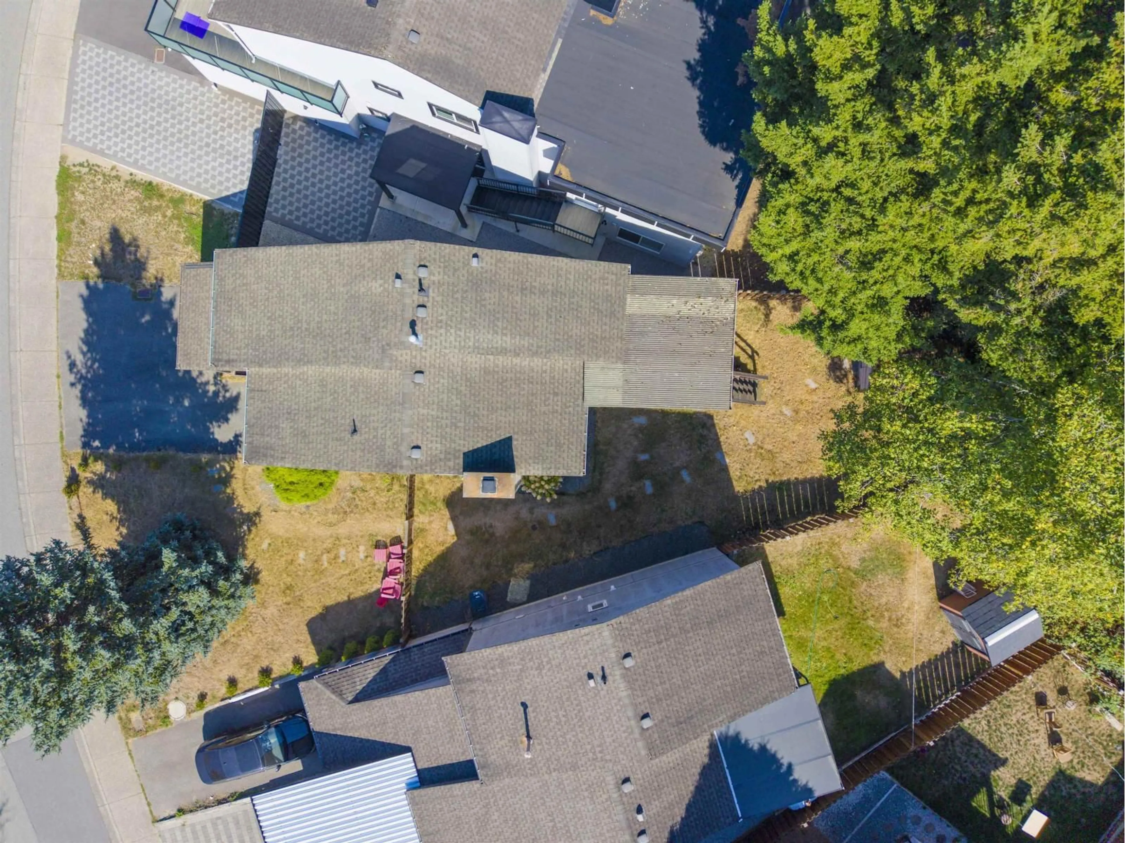 A pic from outside/outdoor area/front of a property/back of a property/a pic from drone, street for 7674 125 STREET, Surrey British Columbia V3W7W4