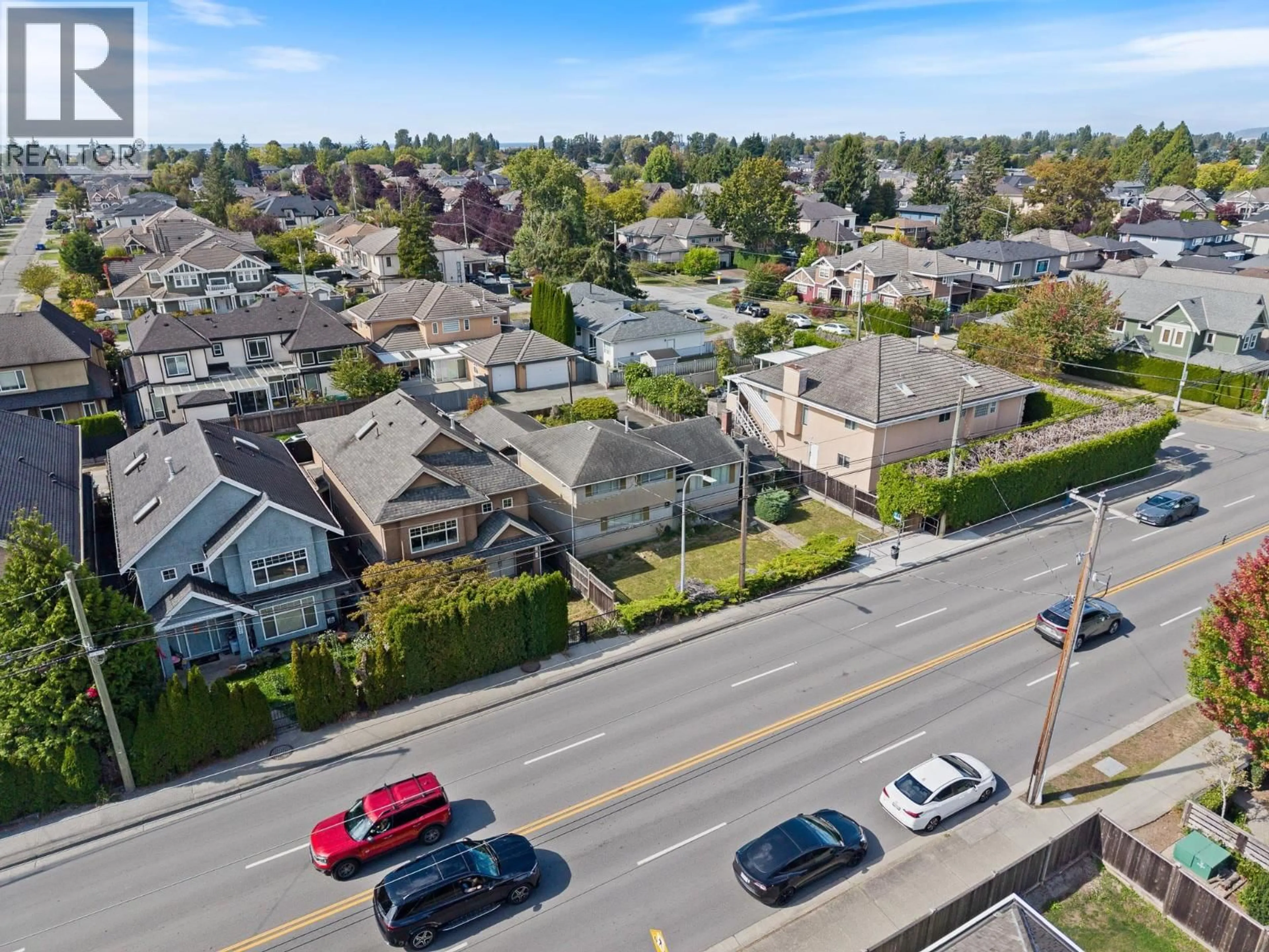 A pic from outside/outdoor area/front of a property/back of a property/a pic from drone, street for 8271 NO. 1 ROAD, Richmond British Columbia V7C1V1