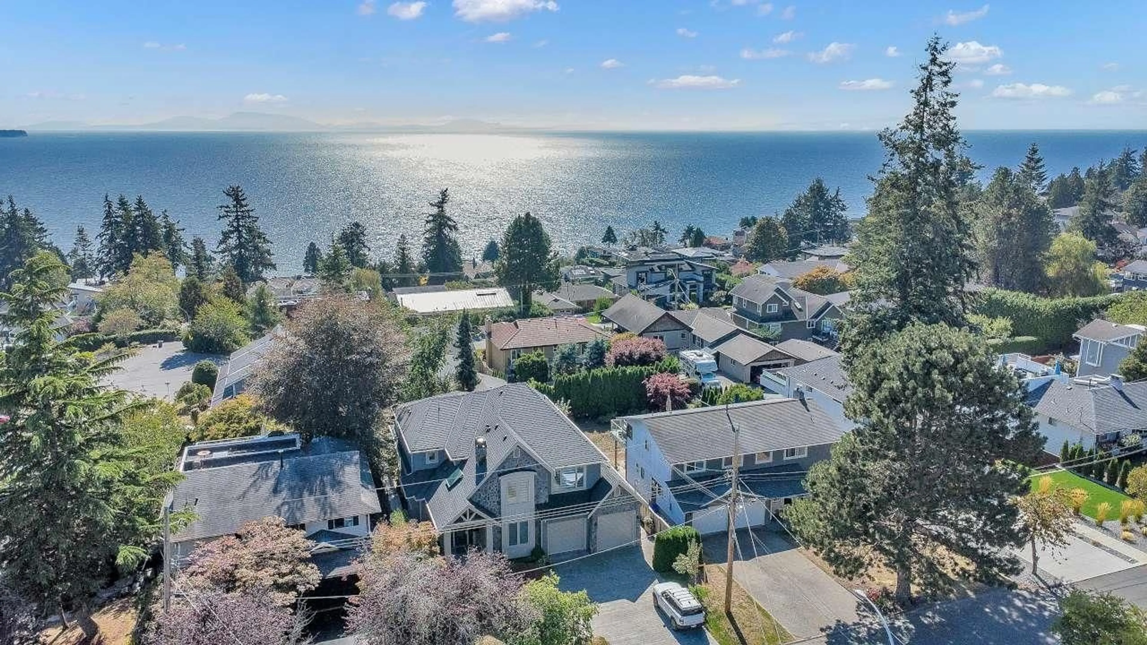 A pic from outside/outdoor area/front of a property/back of a property/a pic from drone, water/lake/river/ocean view for 13242 14A AVENUE, Surrey British Columbia V4A1J3